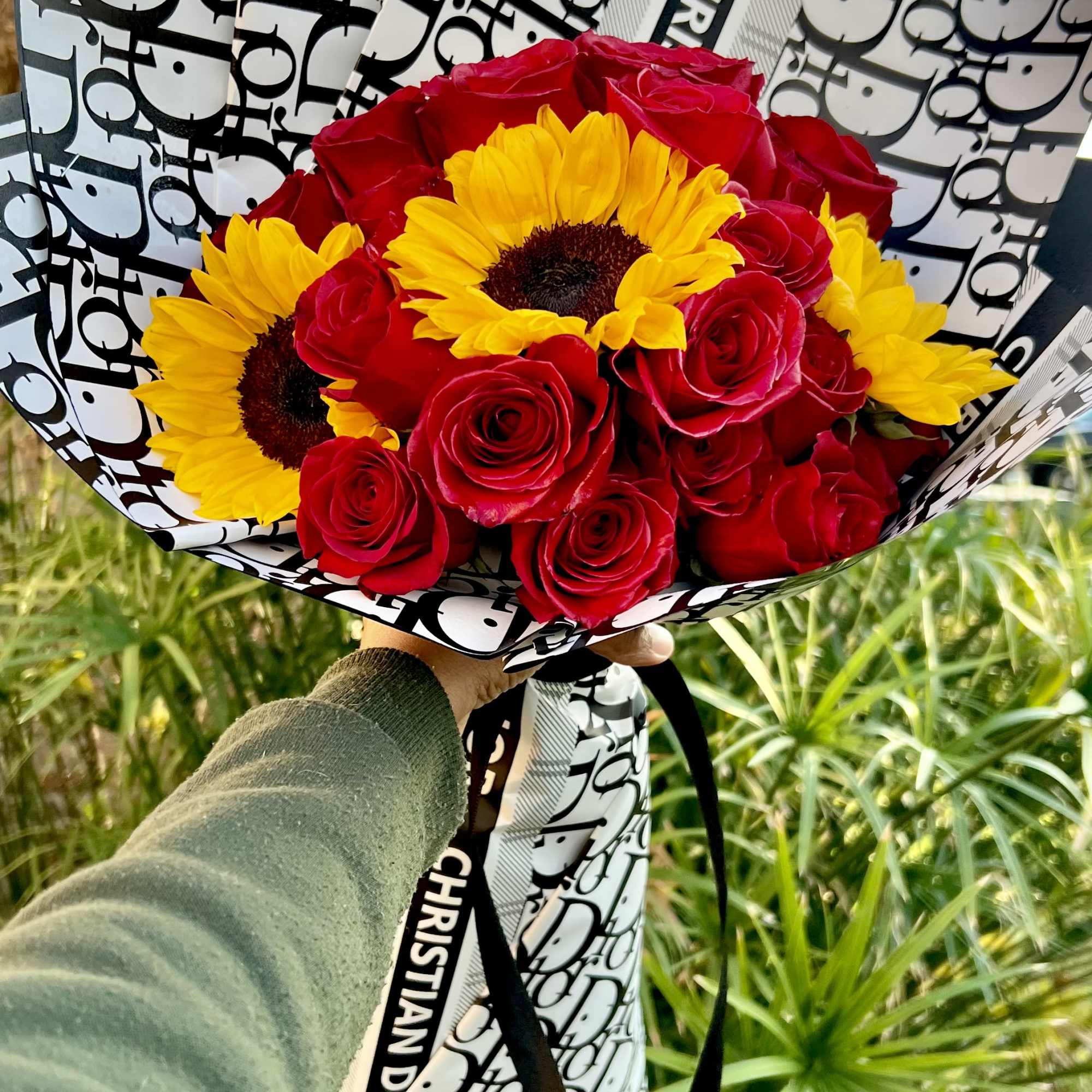 24 Red Roses
5-6 Sunflowers 
Add a touch of designer flair to your 24 Red Roses
5-6 Sunflowers 
Add a touch of designer flair to your