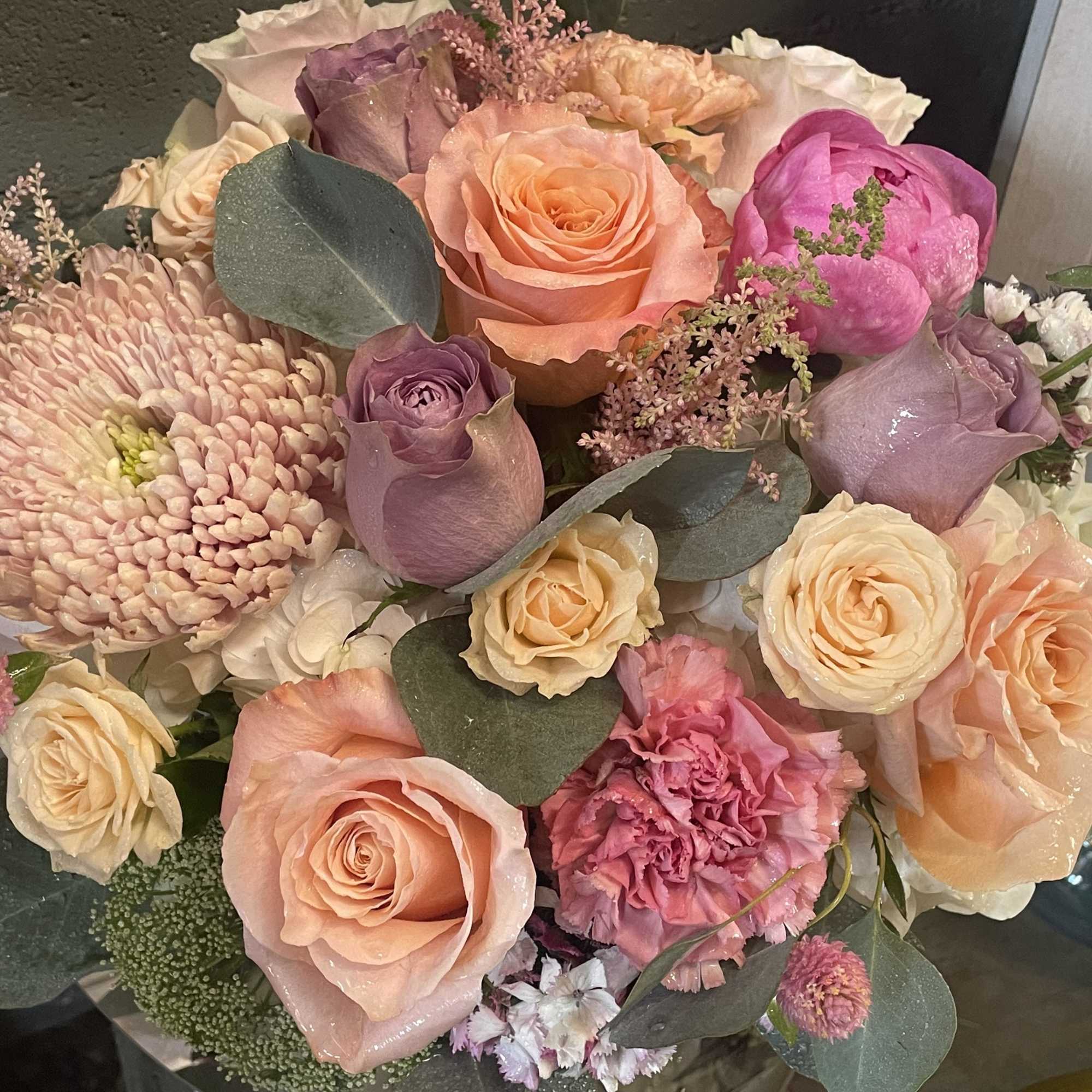 A mix of creams, corals, and textured greens for a cottage by