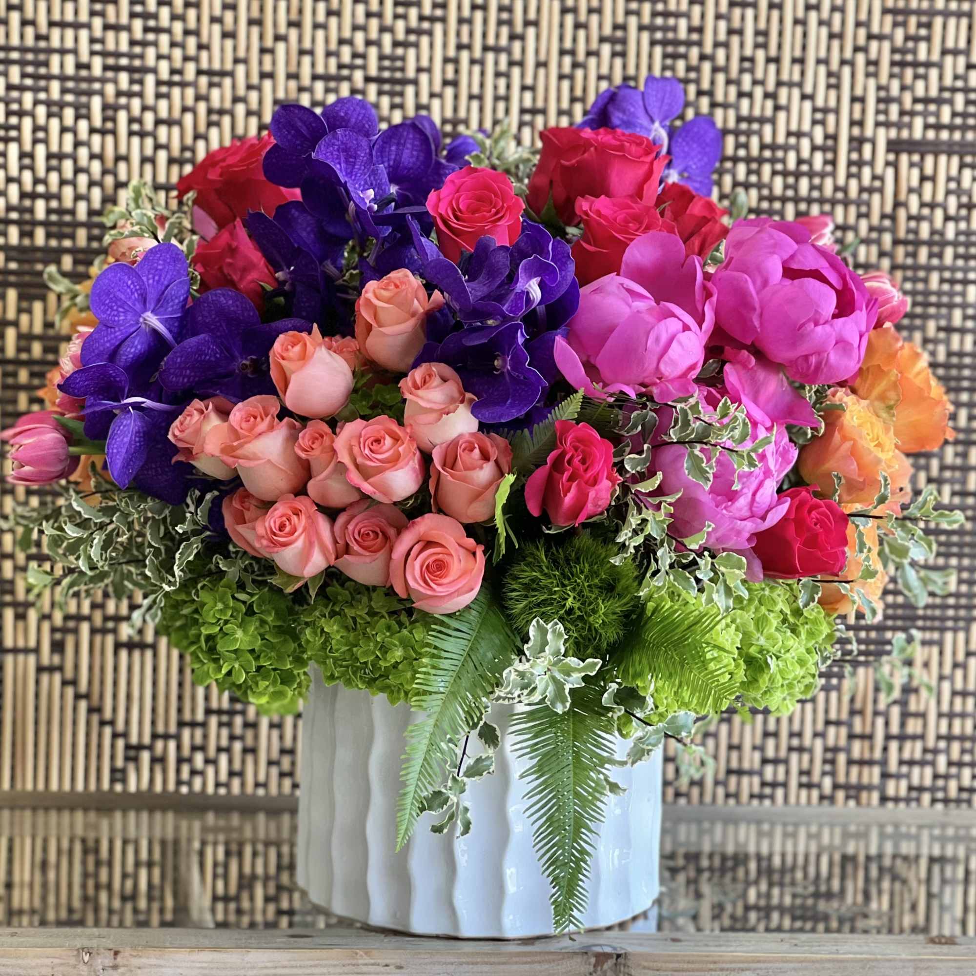 A simple yet super cool arrangement of fragrant purple hyacinth, purple vanda
