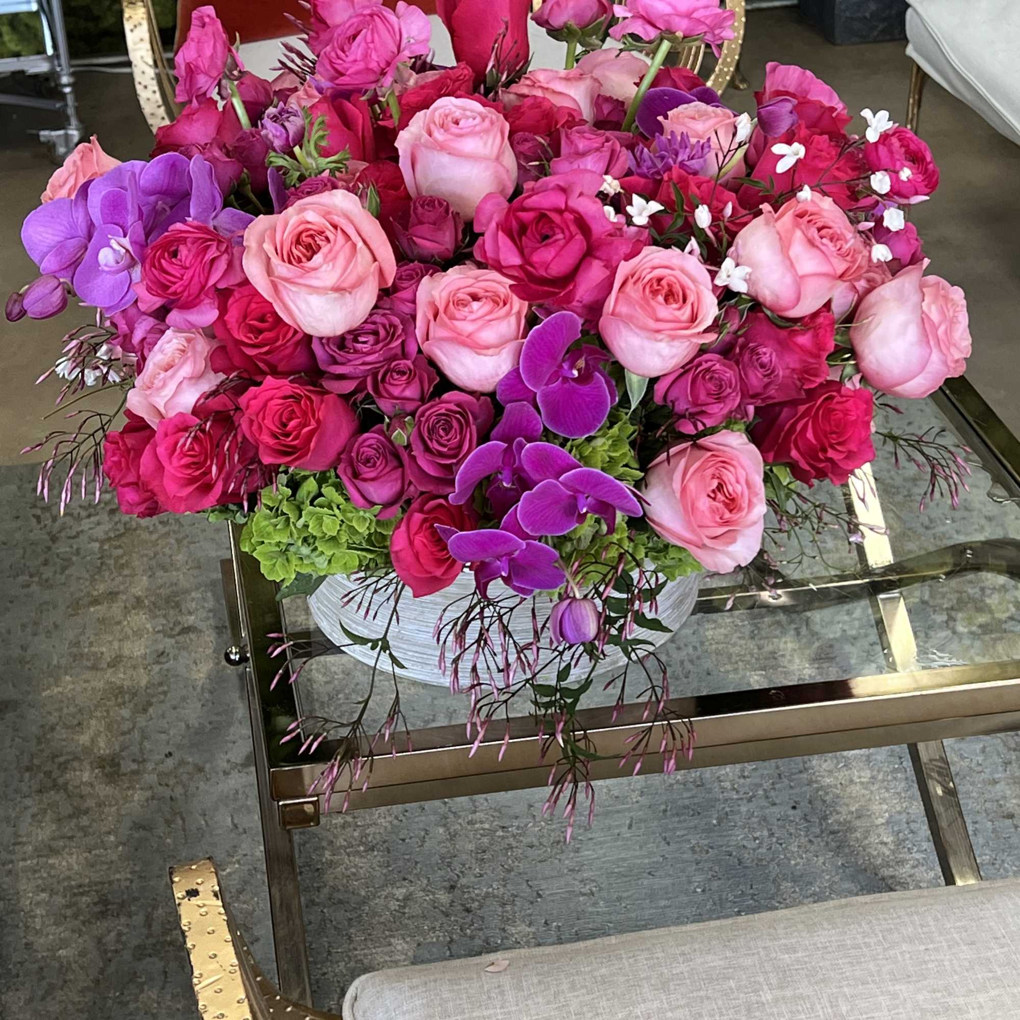 A beautiful celebration of tulips in a large cylinder vase... a perfect
