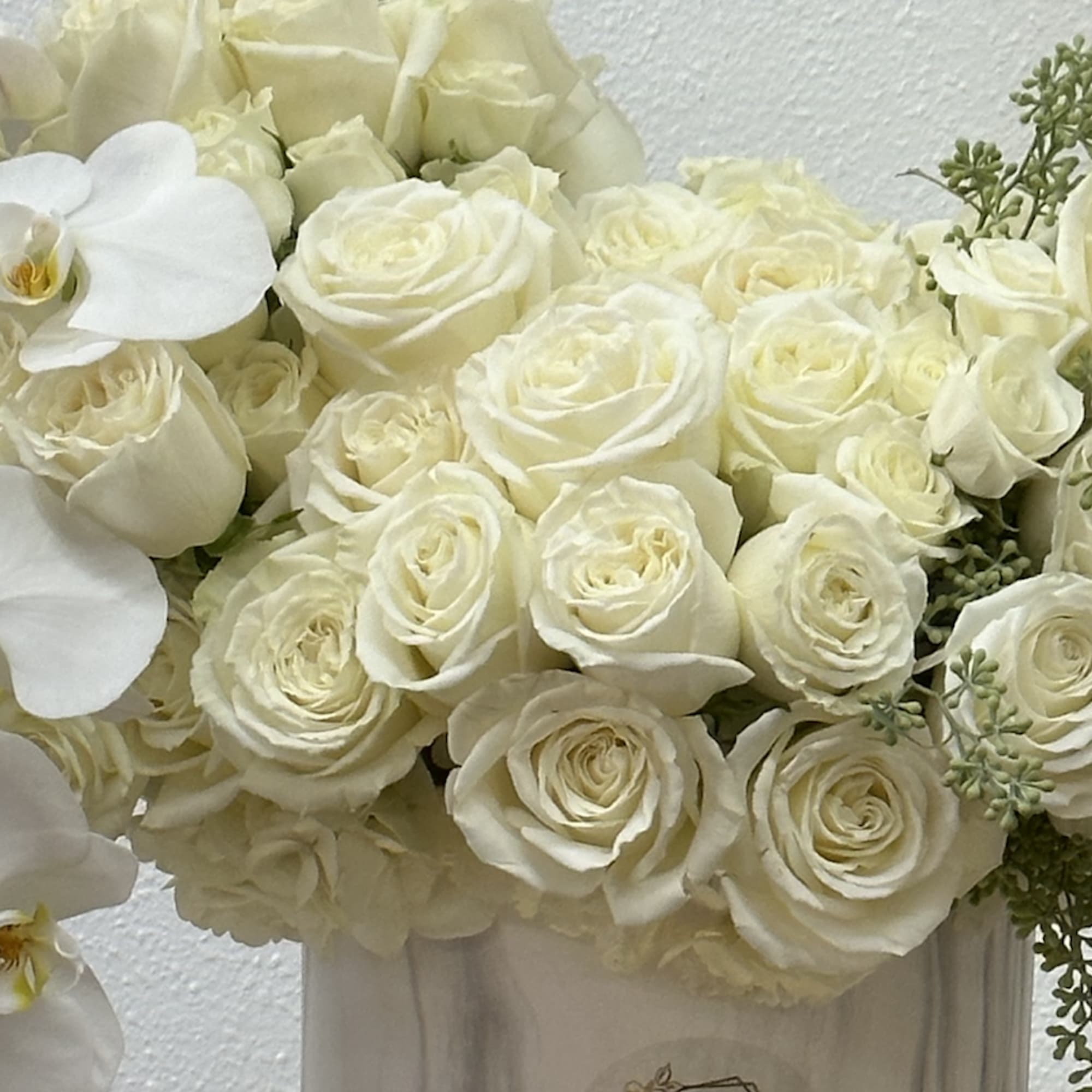 Bring beauty to the table with elegant arrangement, presented in a round