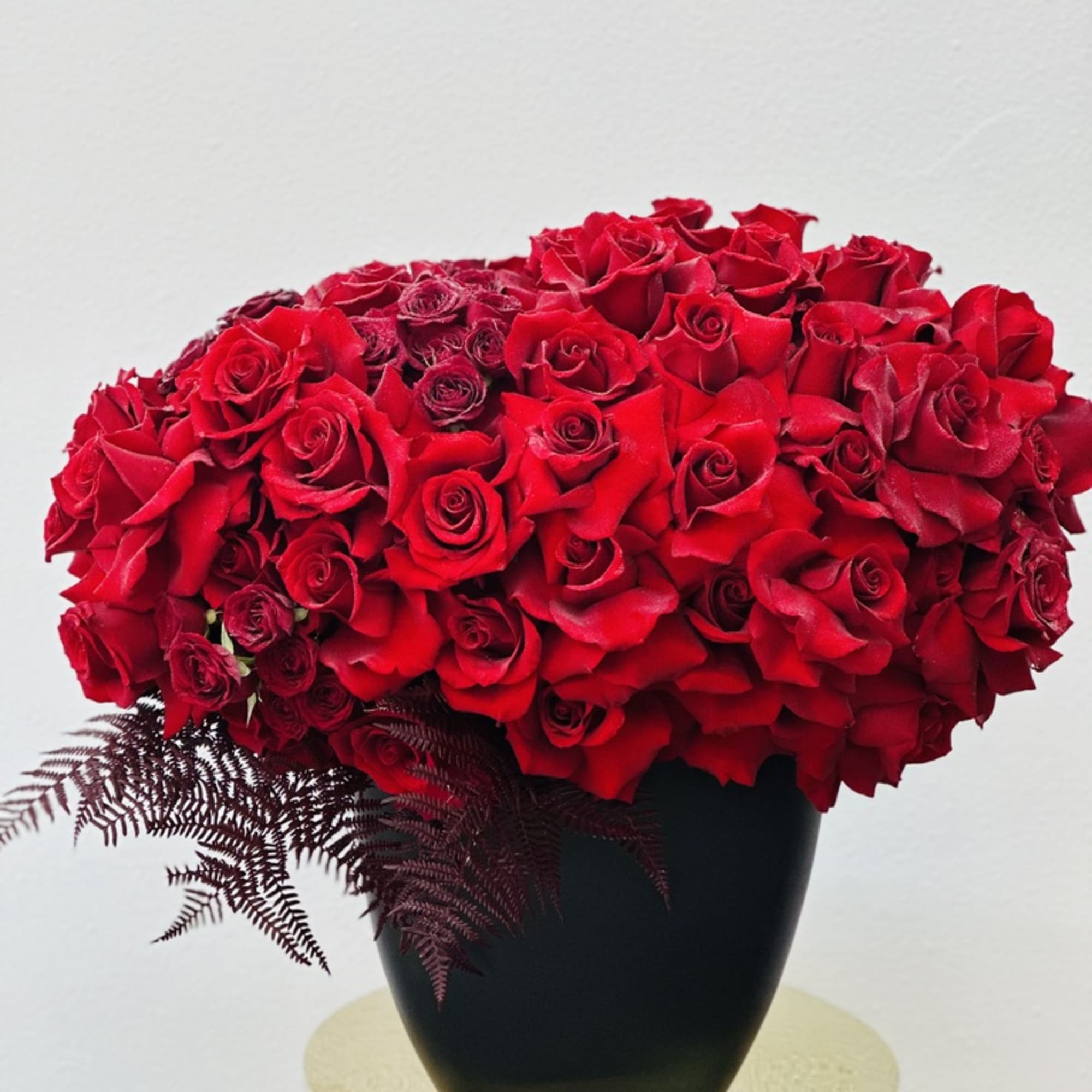 Introducing **Red Reflection**, a striking floral arrangement that showcases the beauty of
