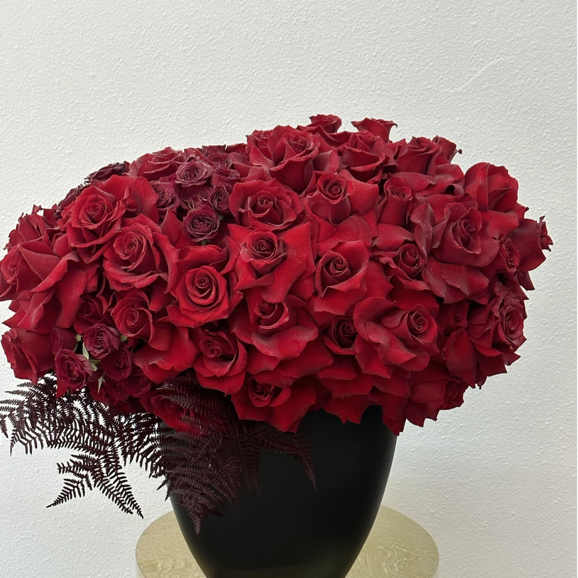 Introducing **Red Reflection**, a striking floral arrangement that showcases the beauty of