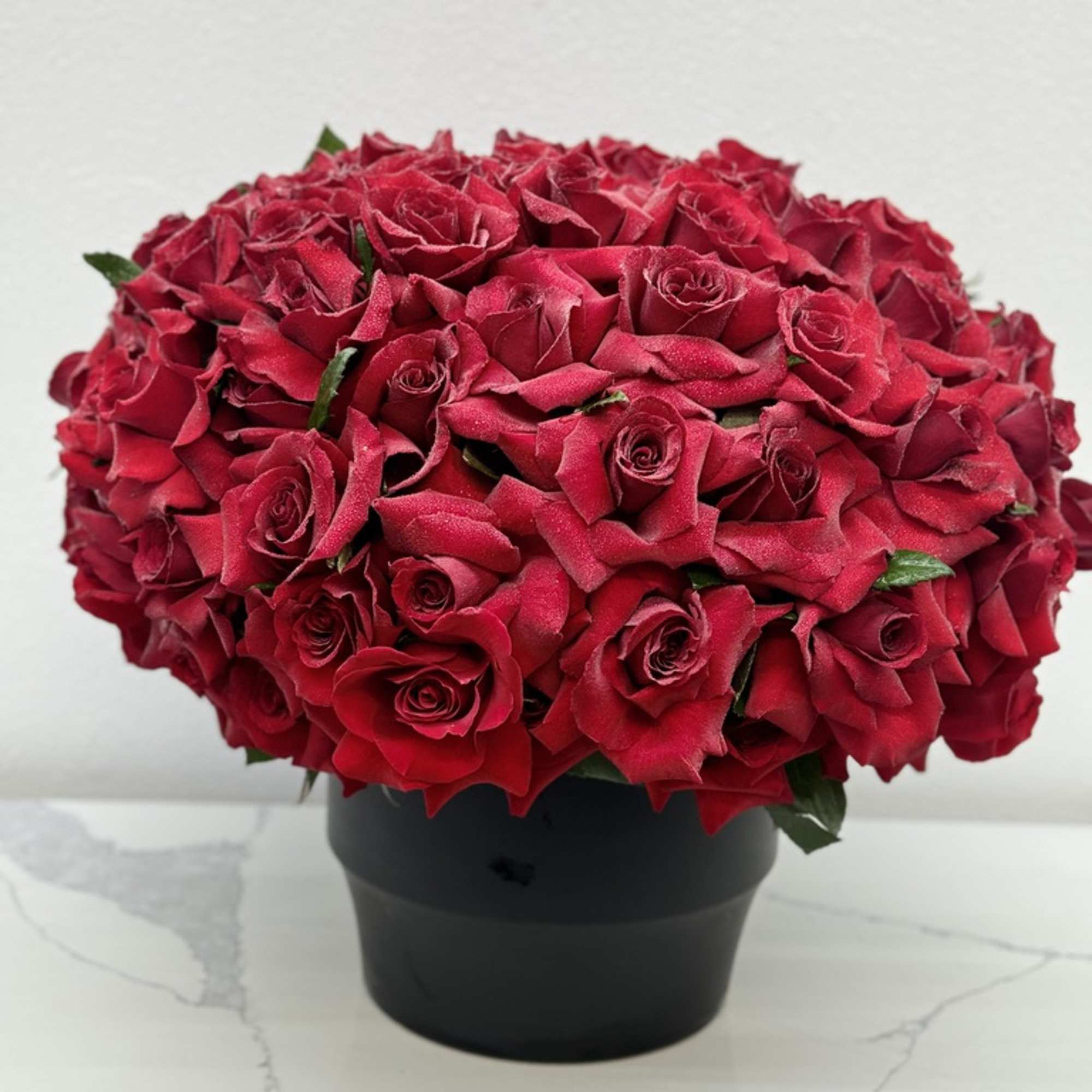 Introducing **Passion in a Vase**, a breathtaking arrangement that showcases beautifully handpicked