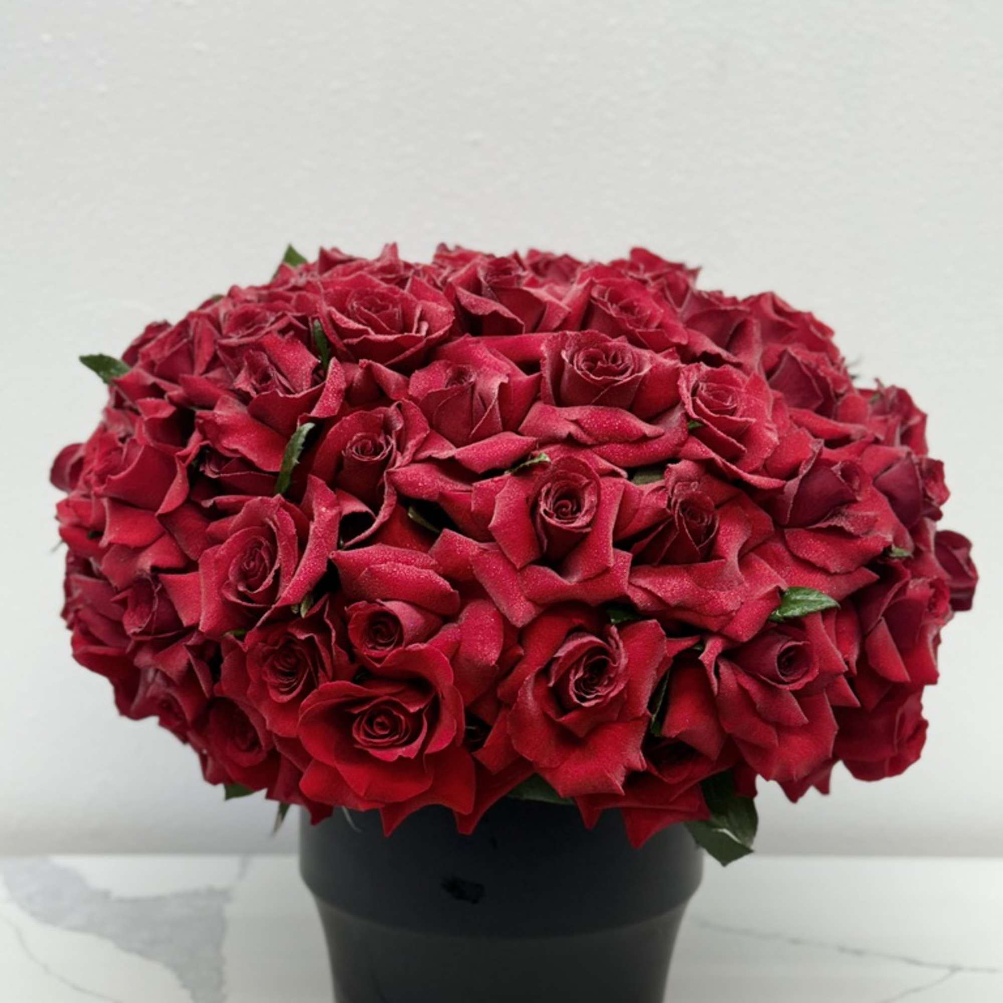 Introducing **Passion in a Vase**, a breathtaking arrangement that showcases beautifully handpicked