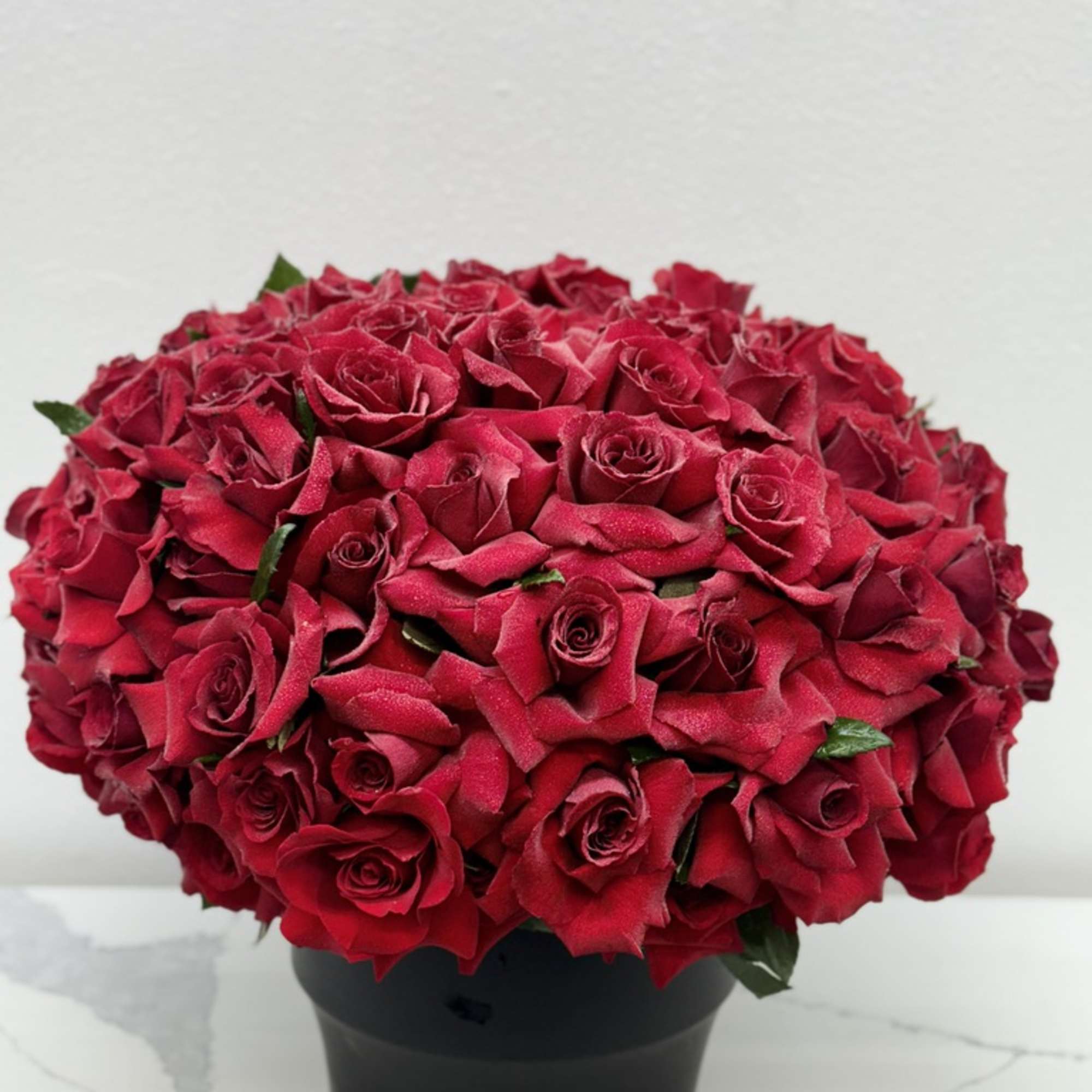 Introducing **Passion in a Vase**, a breathtaking arrangement that showcases beautifully handpicked