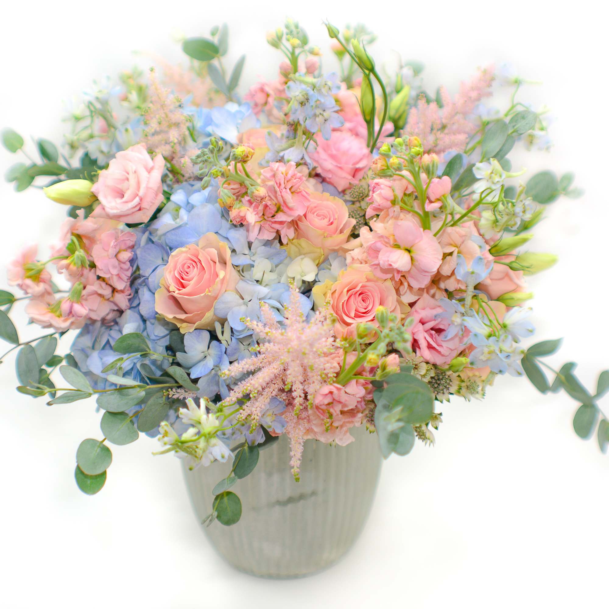 A stunning combination of colors, sweet and lovely. This jewel-toned bouquet includes A stunning combination of colors, sweet and lovely. This jewel-toned bouquet includes