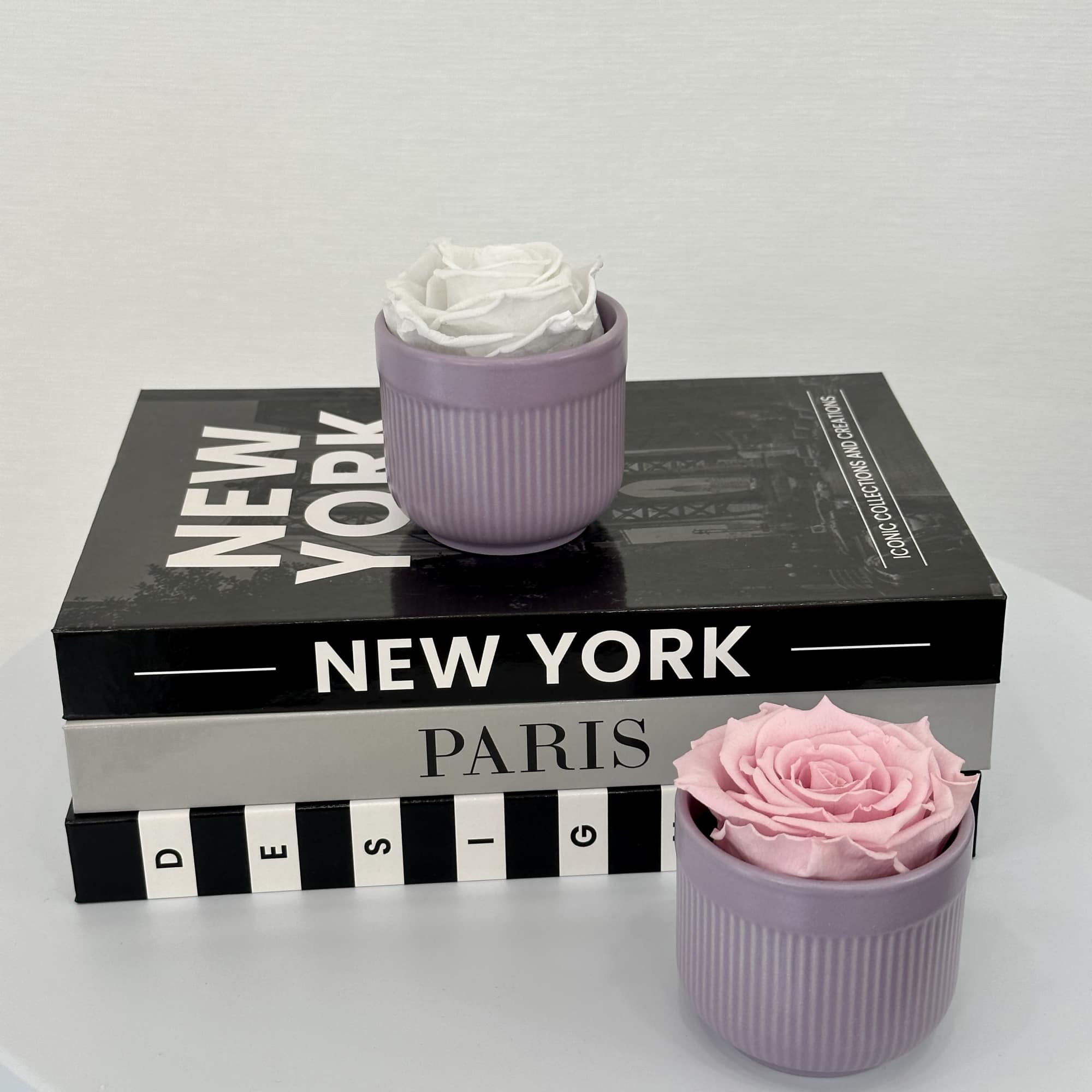 Introducing our exquisite single eternal rose, elegantly displayed in a chic vase.