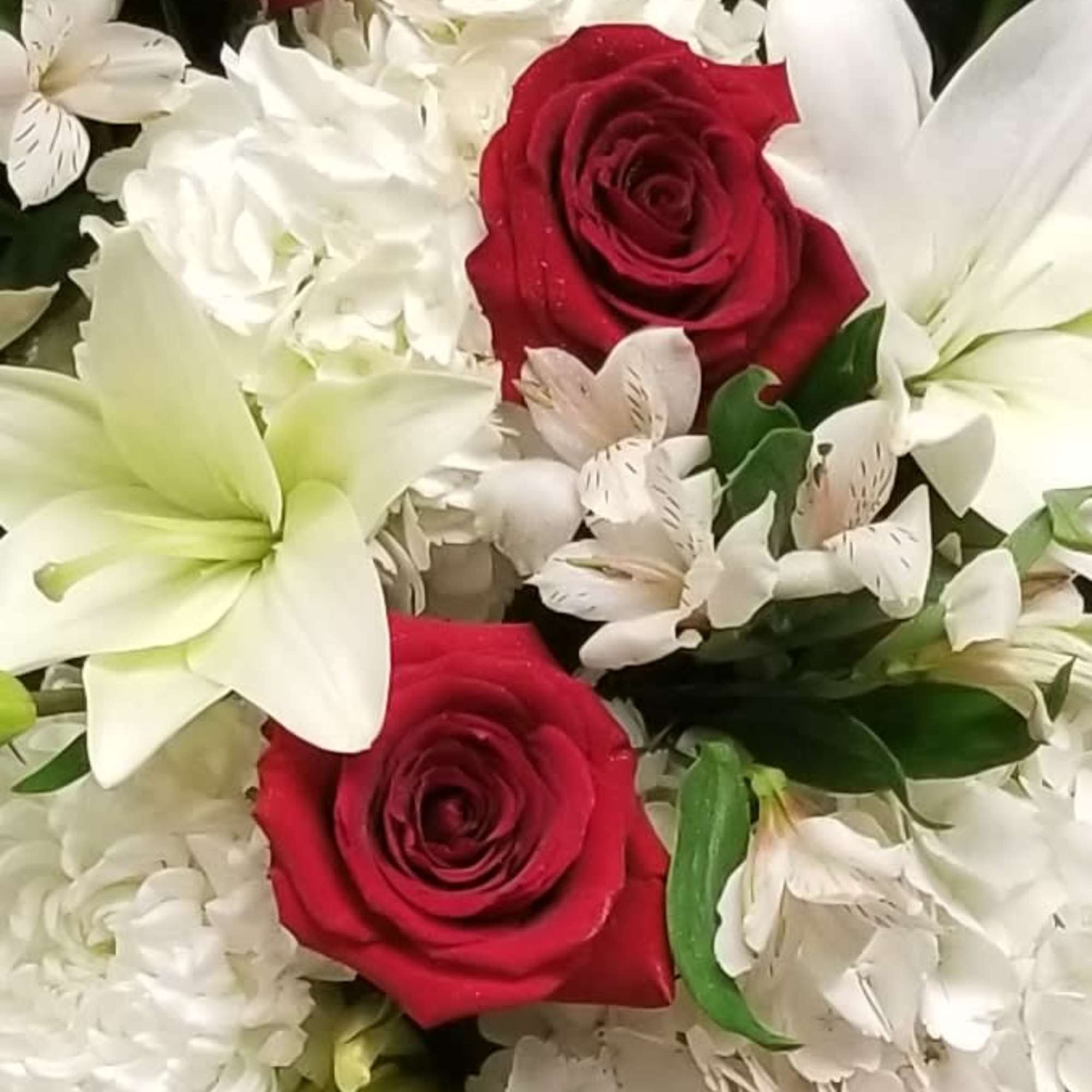 Our talented designers will create an arrangement designed in a vase with