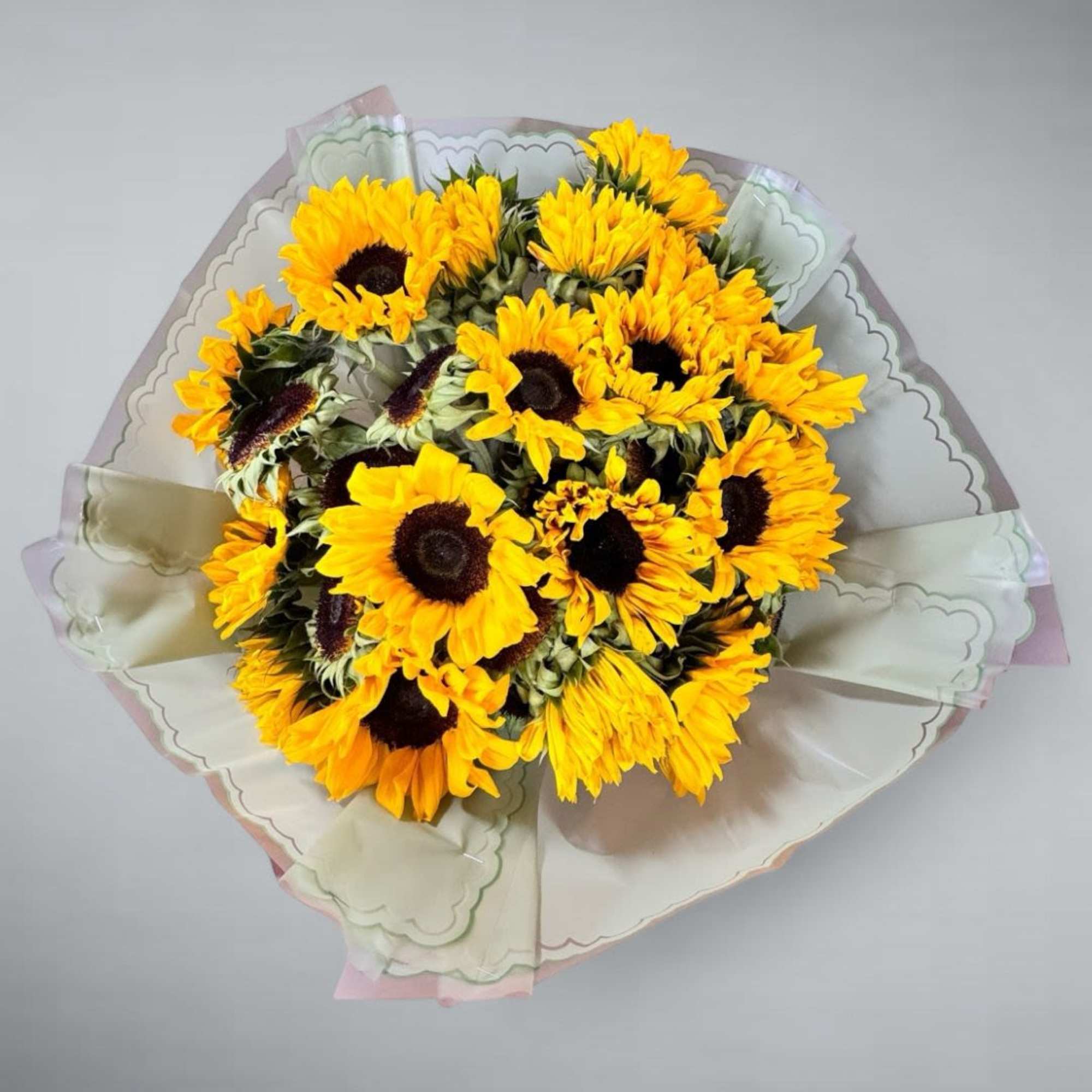 A beautiful arrangement of sunflowers, elegant and casual for your favorite person.
