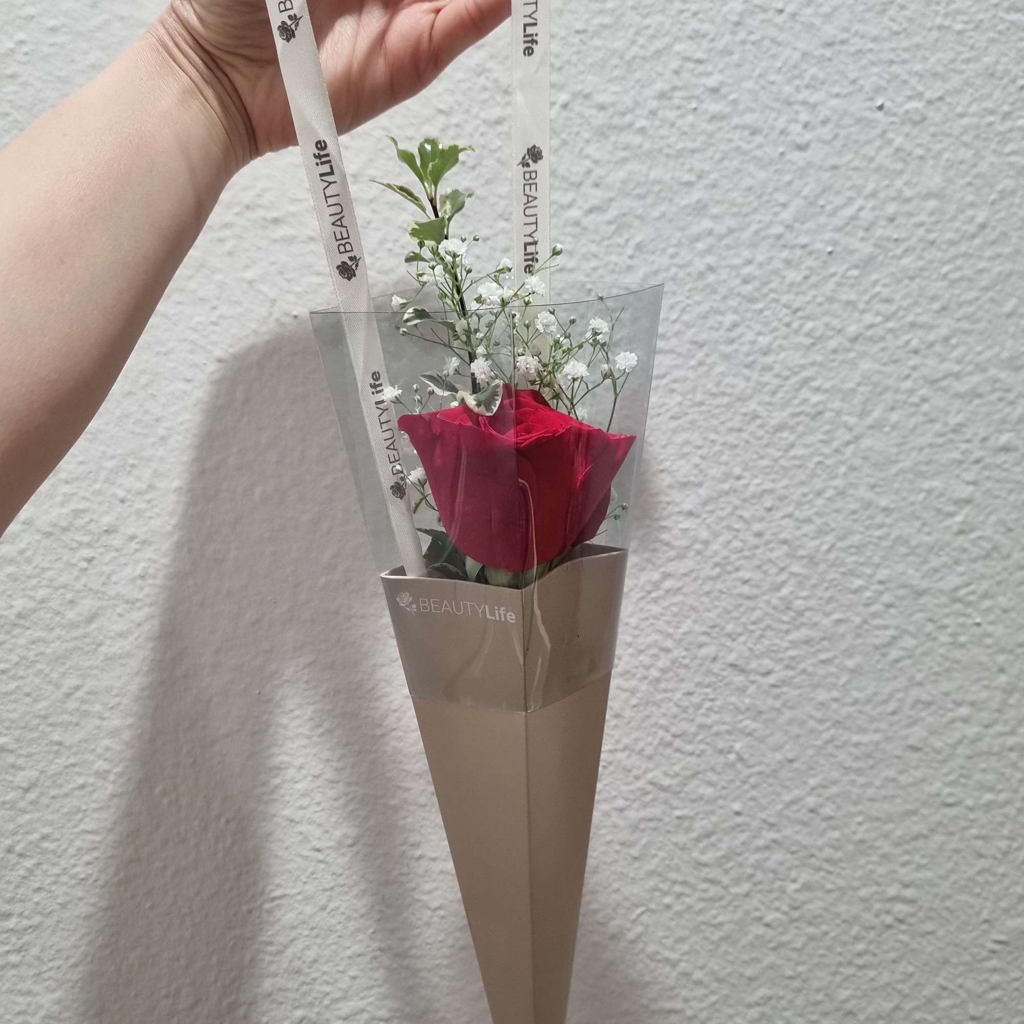 
A stem of a rose in a beautiful box is the perfect