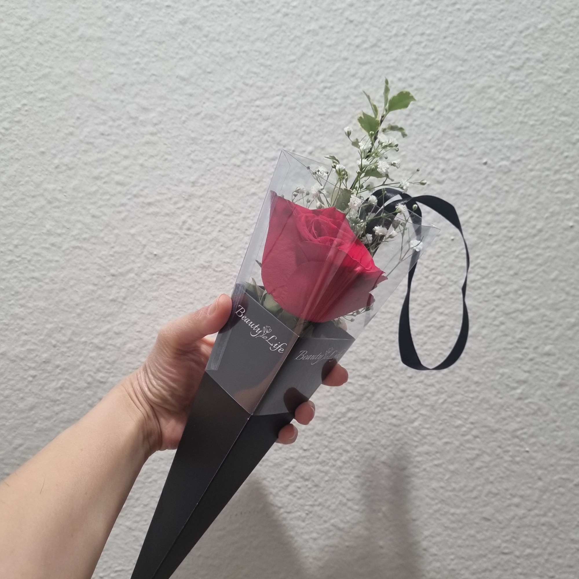 
A stem of a rose in a beautiful box is the perfect
