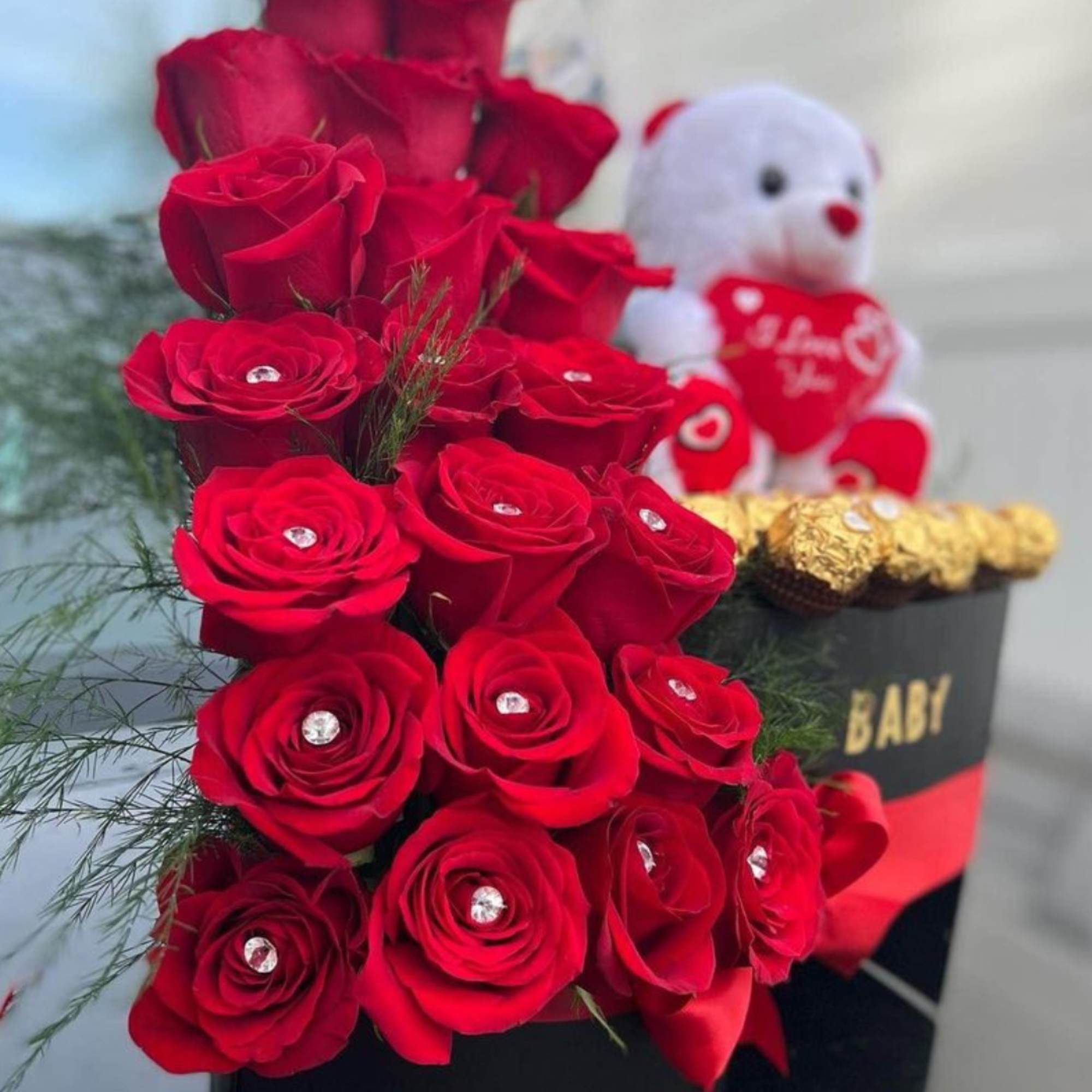 We will custom design a heart shaped centerpiece with roses and ferrero We will custom design a heart shaped centerpiece with roses and ferrero