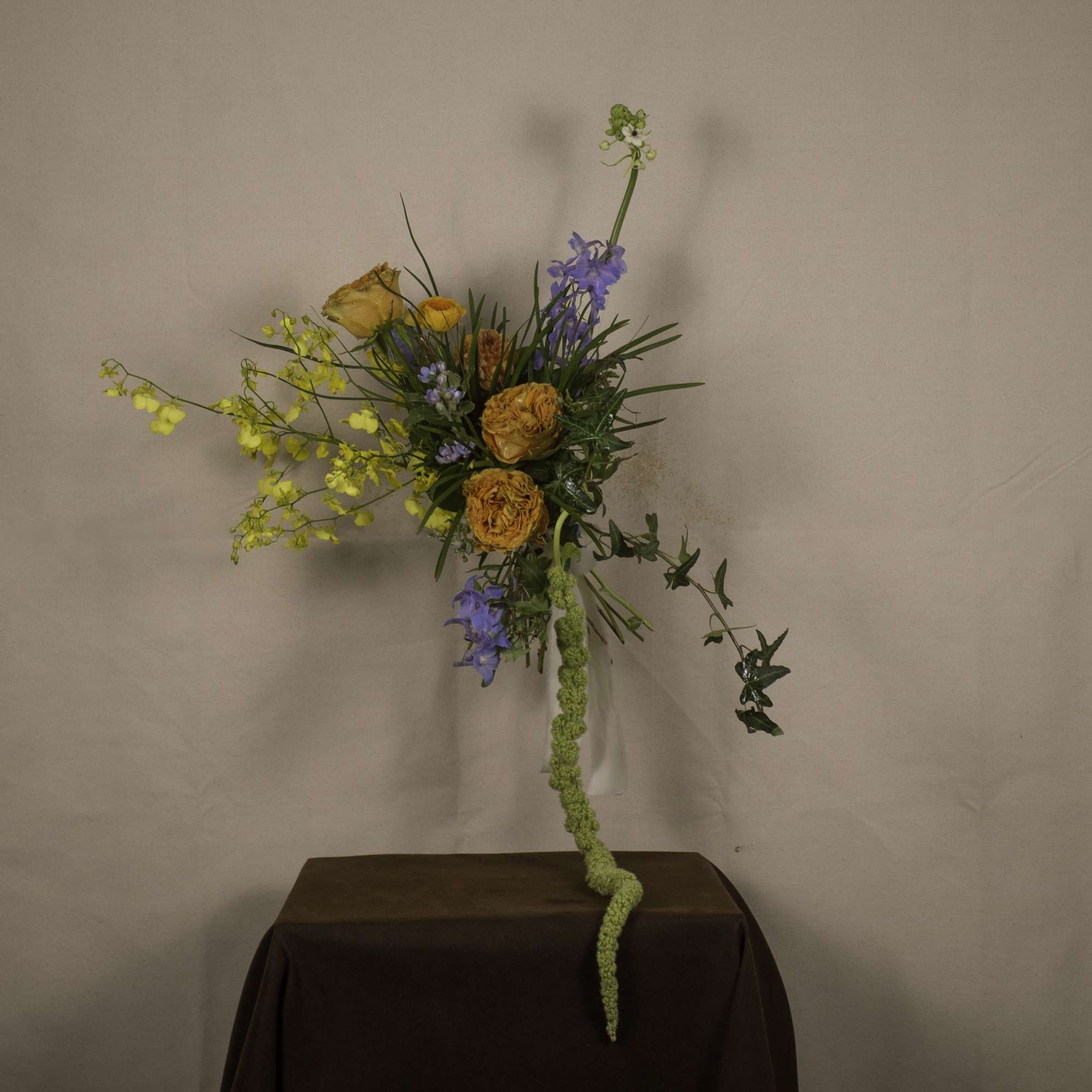 &quot;Keighley&quot; is a striking hand-tied bouquet, blending vibrant hues with elegant textures.