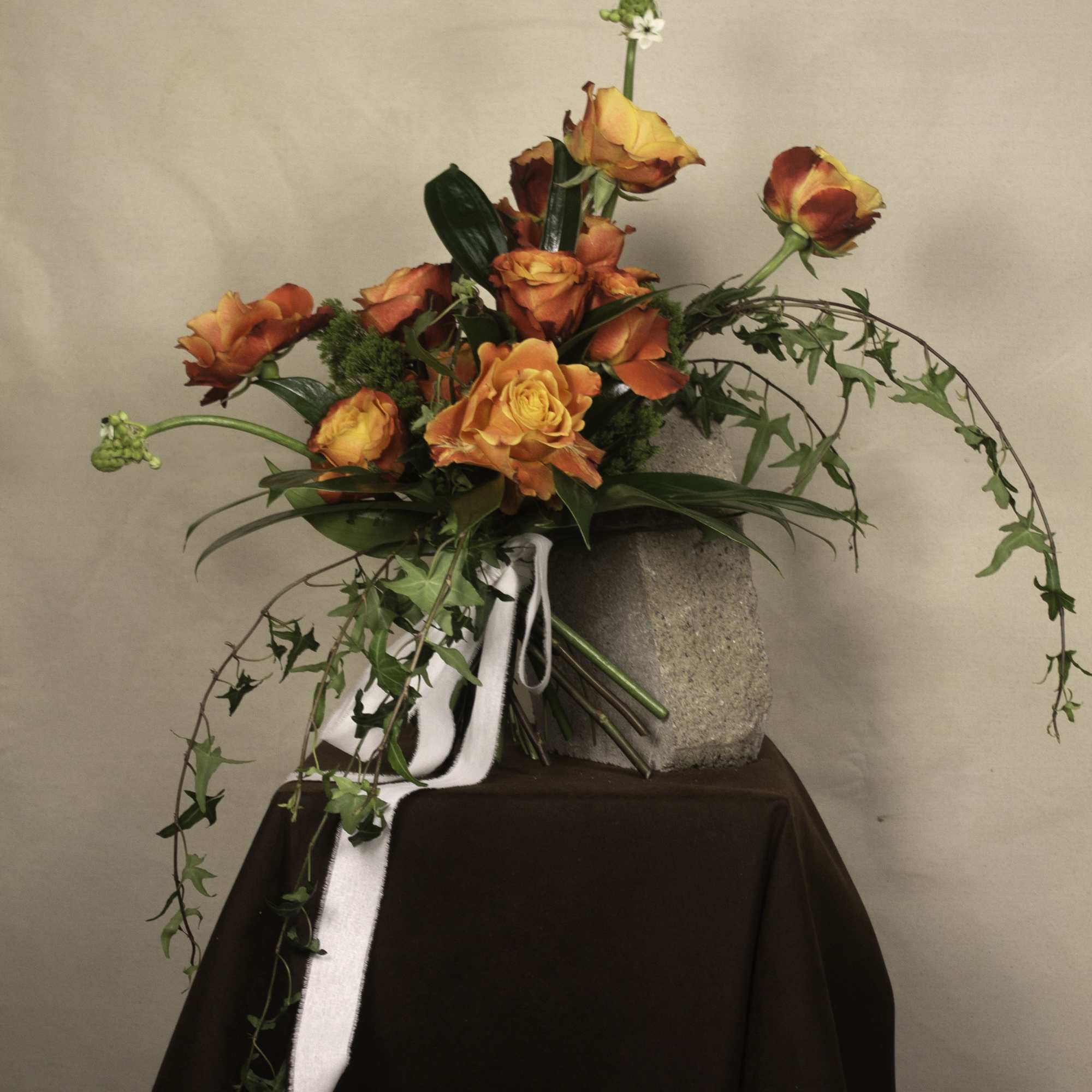 A bouquet of timeless elegance, featuring a dozen premium roses wrapped beautifully A bouquet of timeless elegance, featuring a dozen premium roses wrapped beautifully