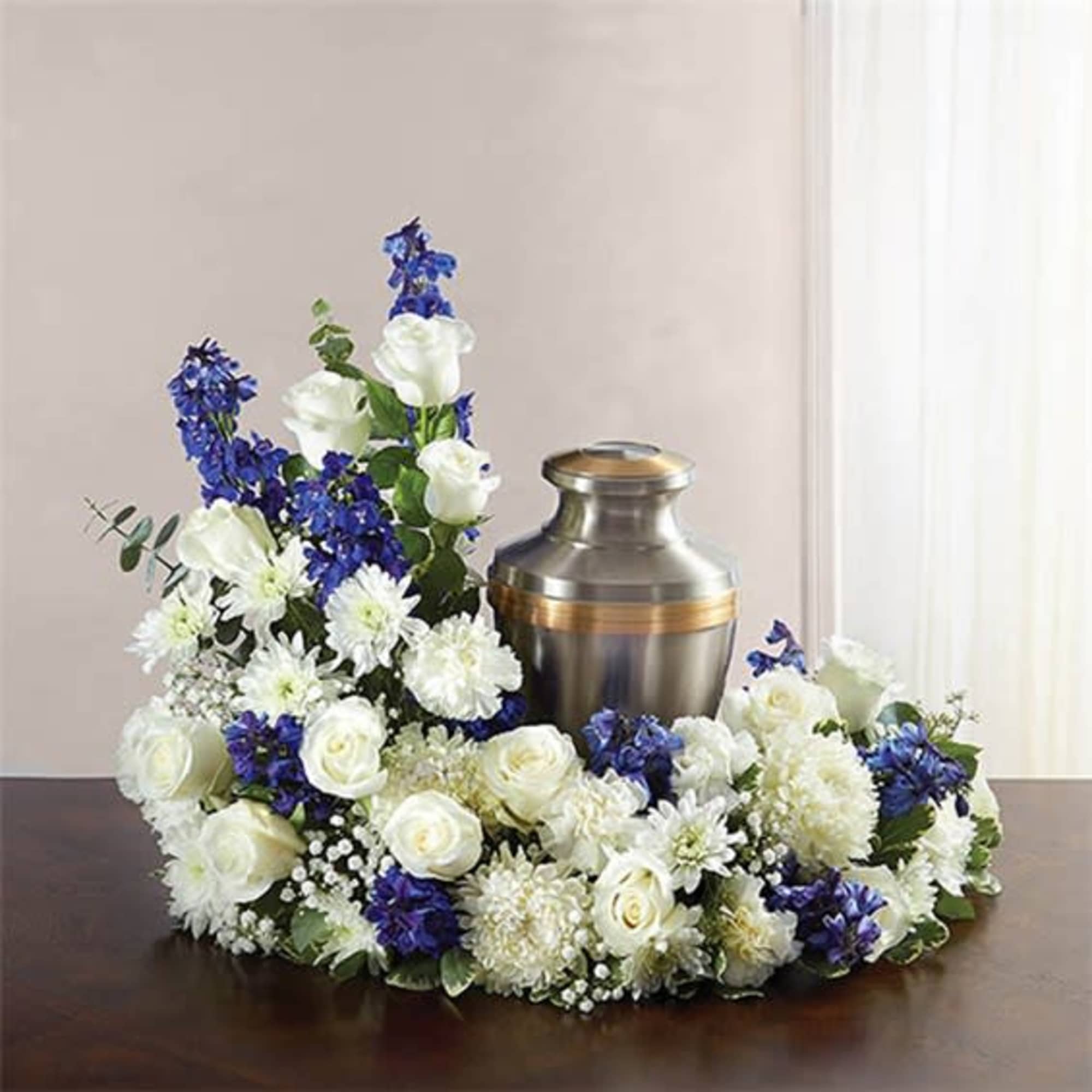 "Honor a life so beautifully lived. Our florists artistically hand-design an asymmetrical
