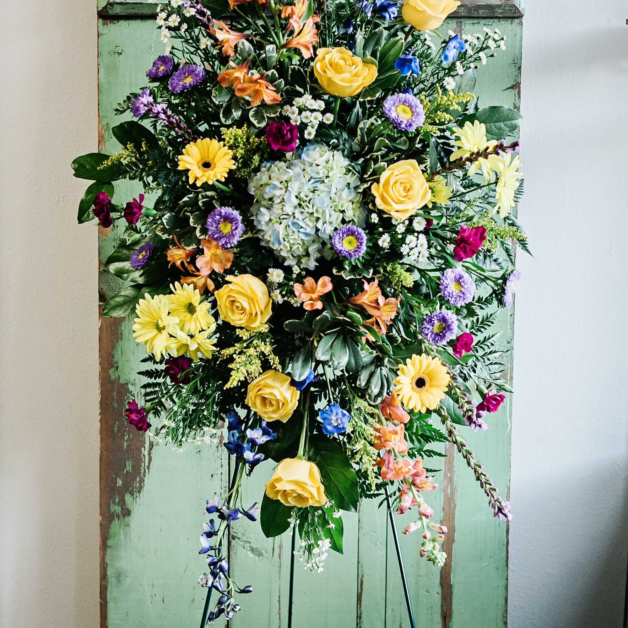 A bright, bold and beautiful spray of flowers for a celebration of A bright, bold and beautiful spray of flowers for a celebration of