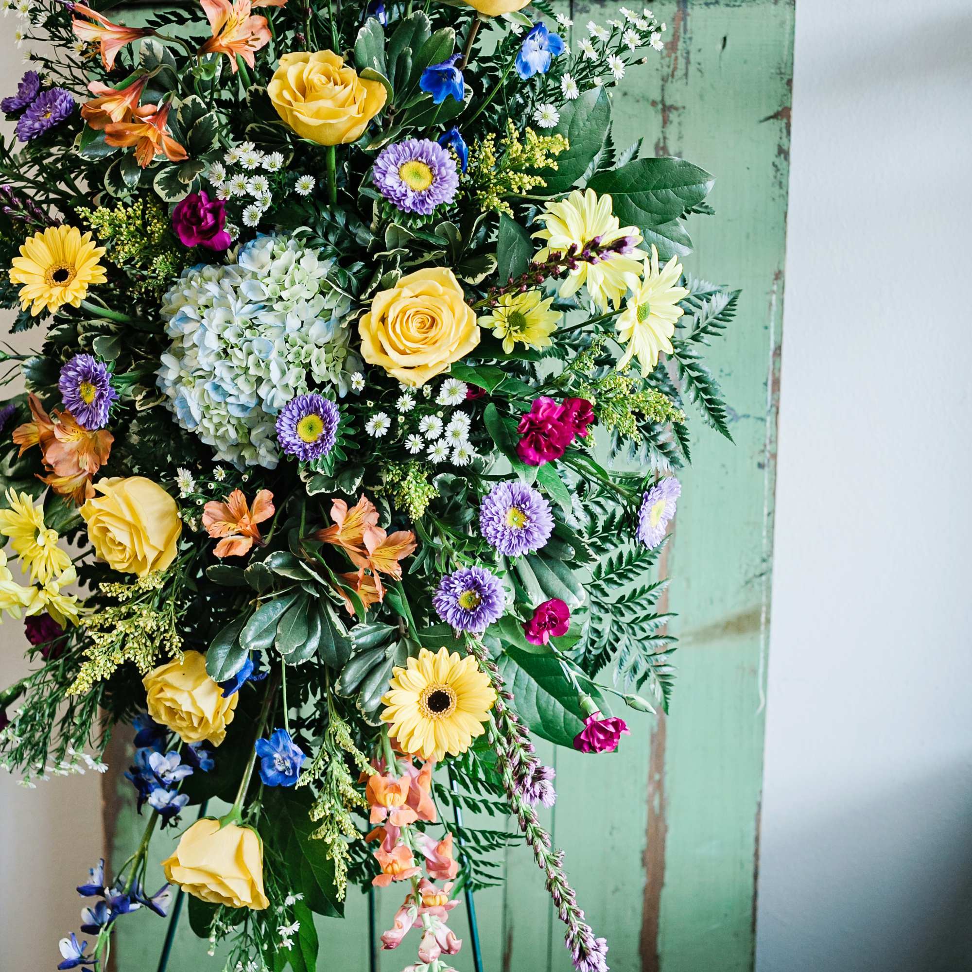 A bright, bold and beautiful spray of flowers for a celebration of A bright, bold and beautiful spray of flowers for a celebration of