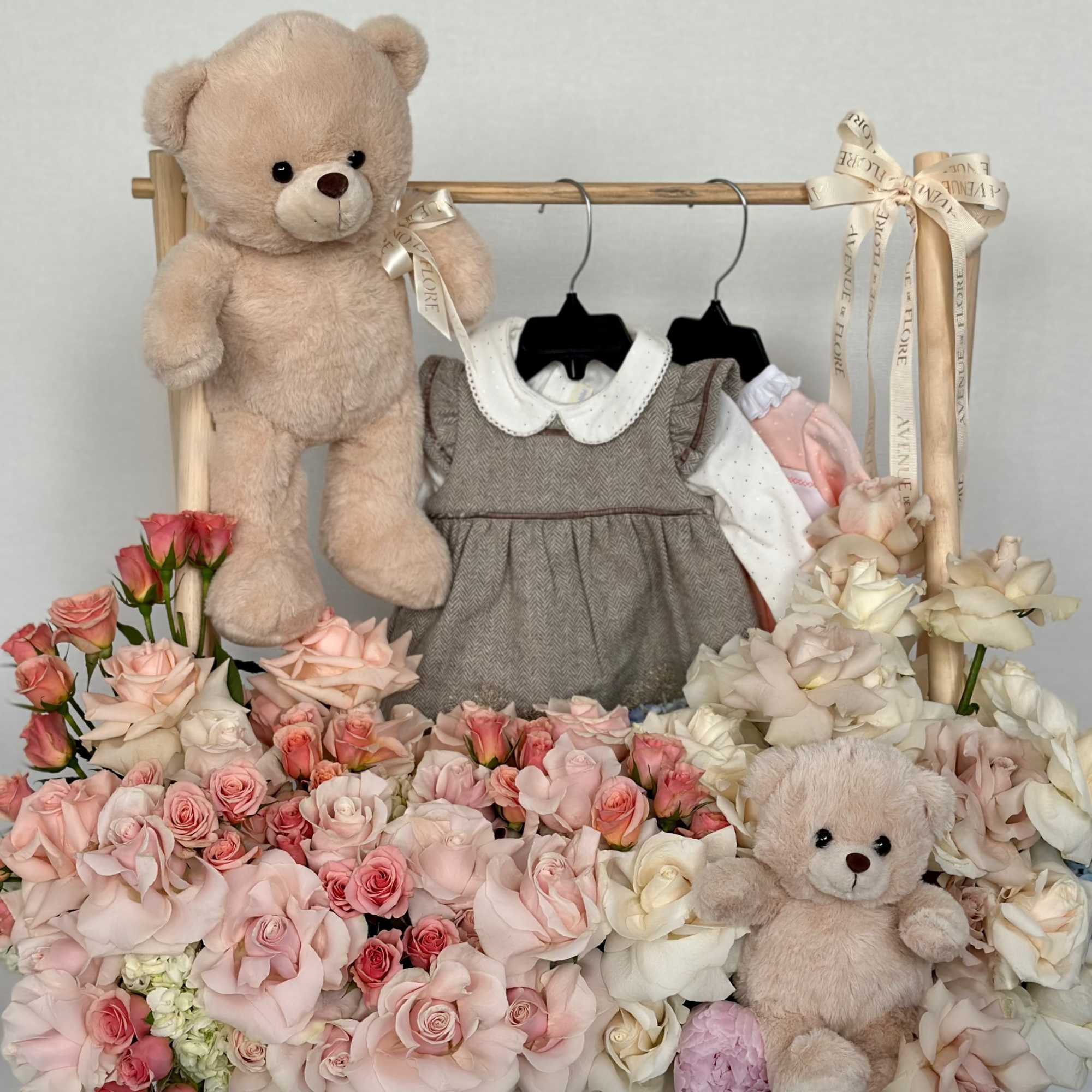 Celebrate the arrival of a precious little princess with this charming arrangement