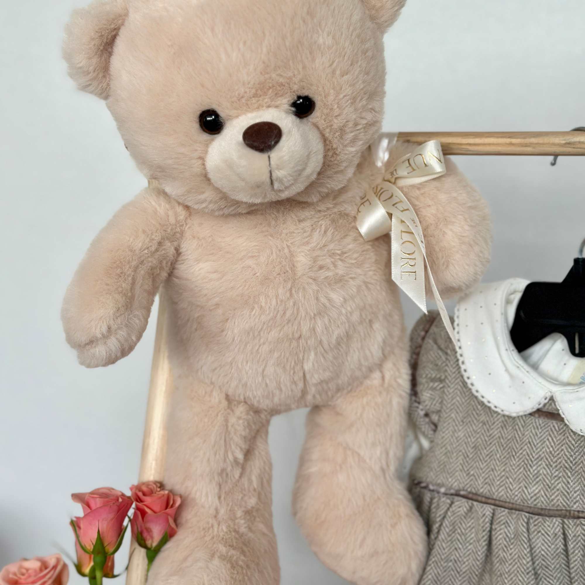 Celebrate the arrival of a precious little princess with this charming arrangement