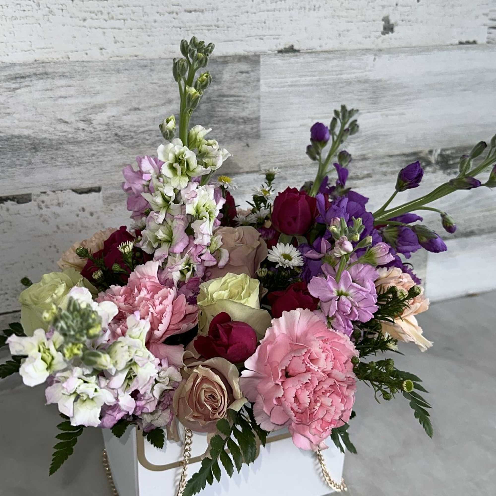 beautiful pink / white or black purse with flowers such as roses