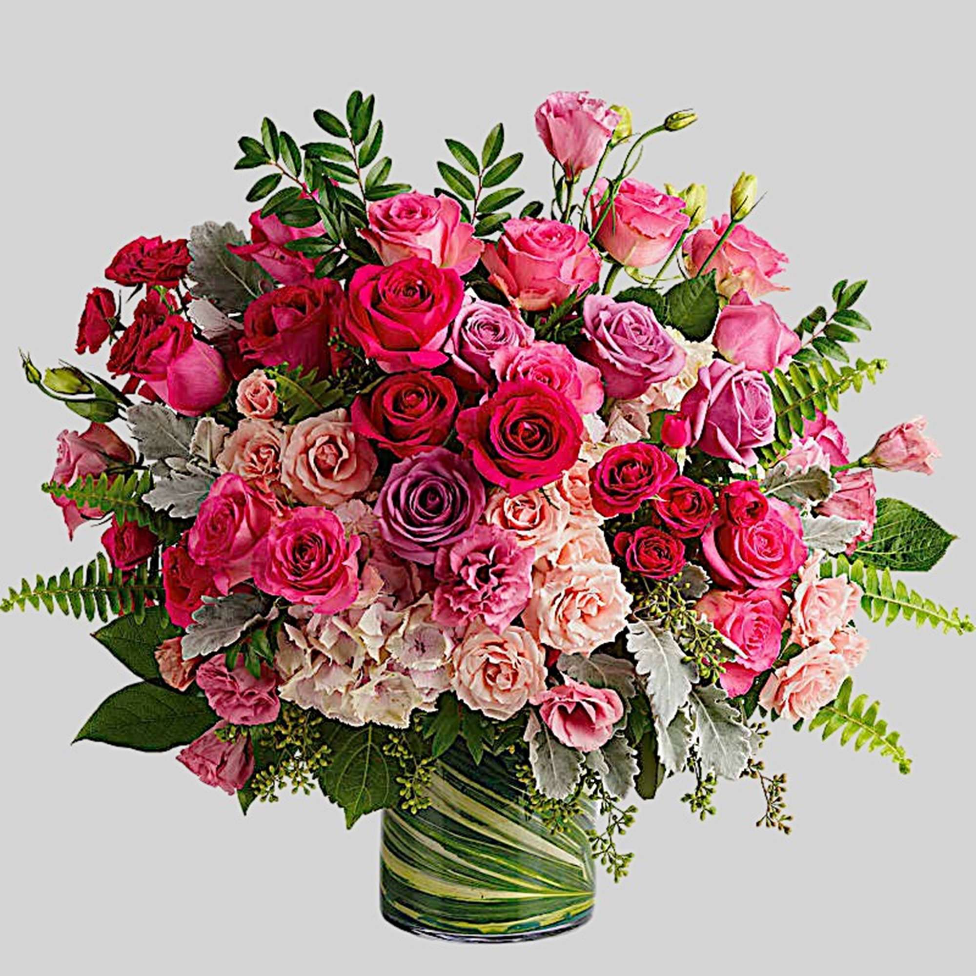 Spoil them rotten with this heavenly, high-fashion rose creation! Ravishing roses in