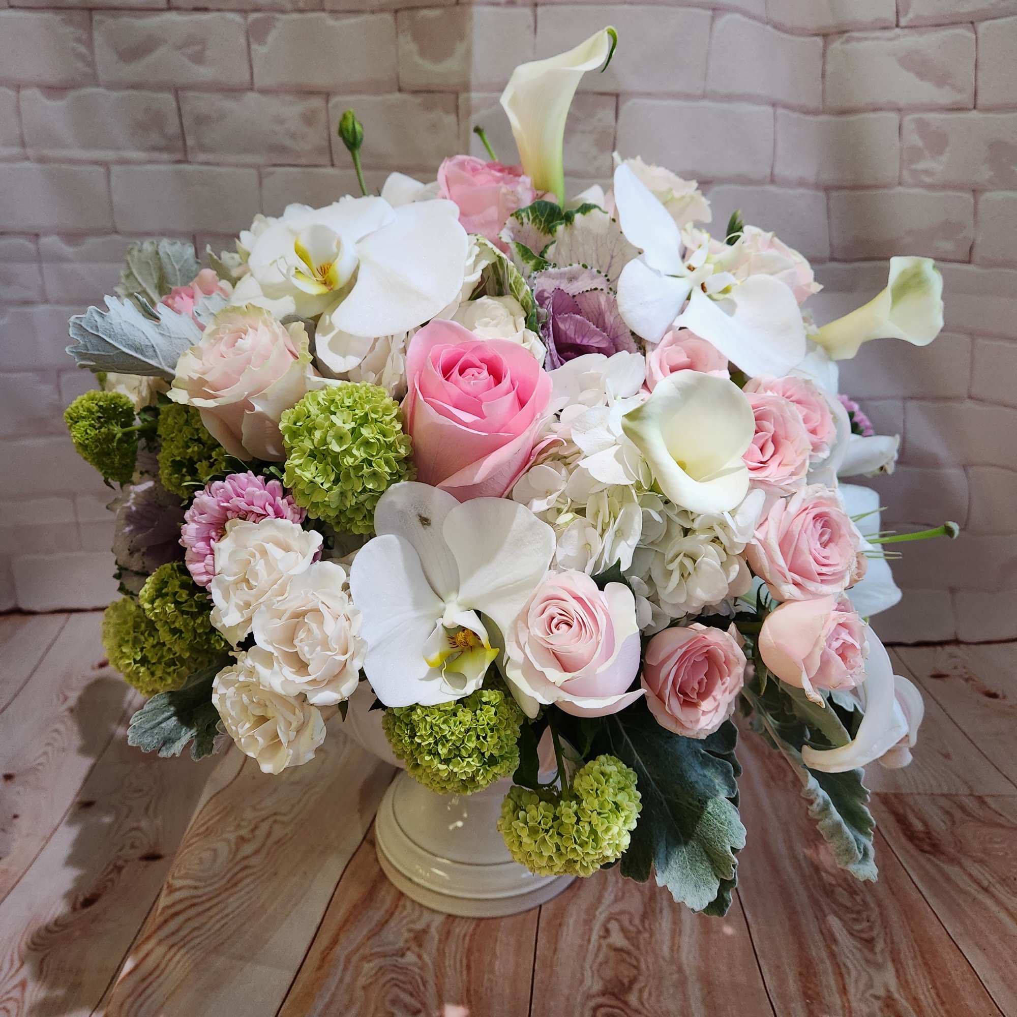 This beautiful majestic garden of roses,  lush hydrangeas, spray roses 
