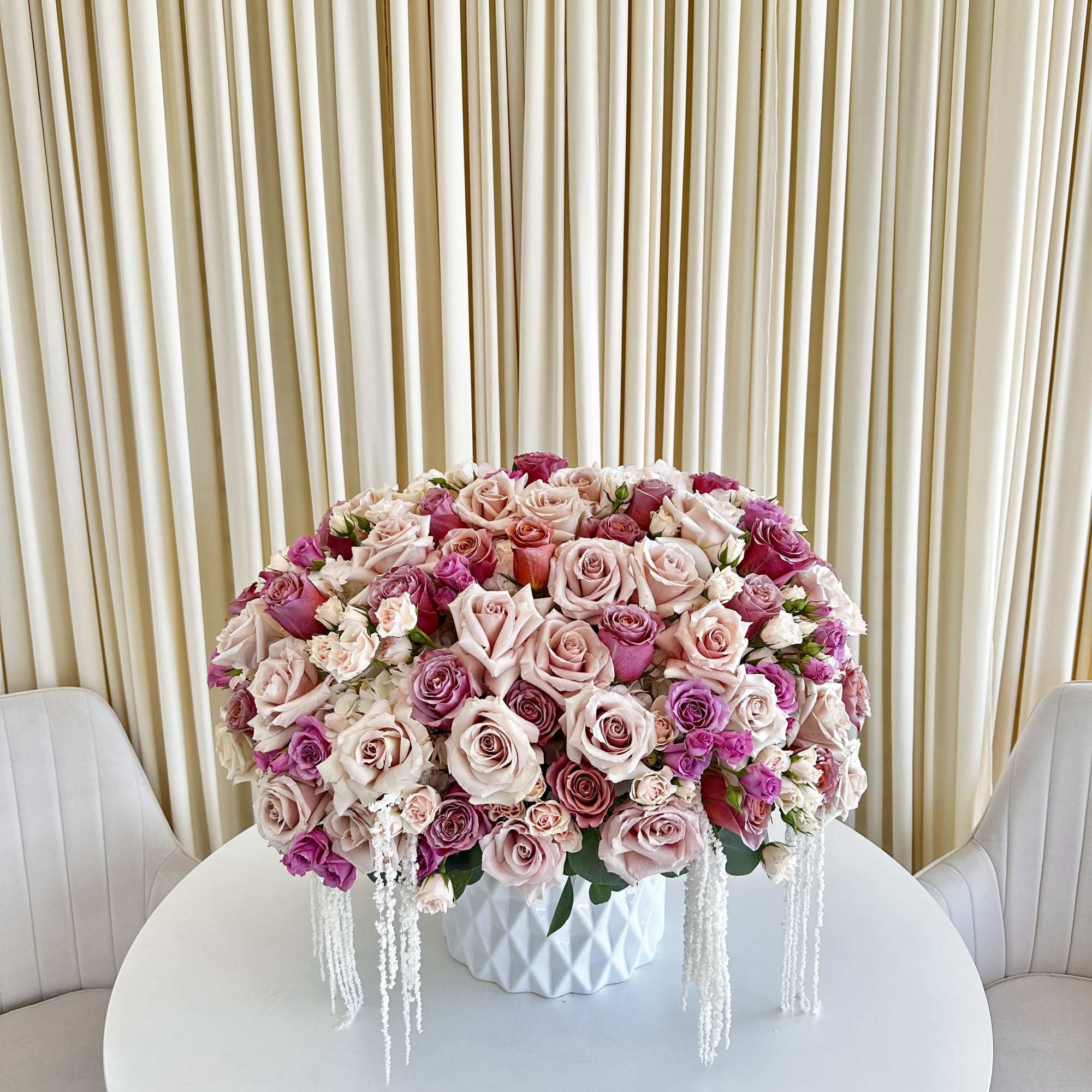 Introducing the &quot;Blushing Rose Cascade,&quot; a spectacular floral arrangement that captures the