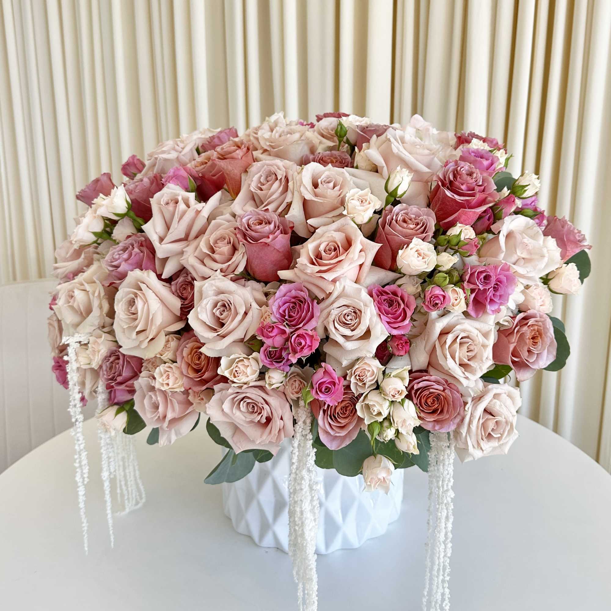 Introducing the &quot;Blushing Rose Cascade,&quot; a spectacular floral arrangement that captures the