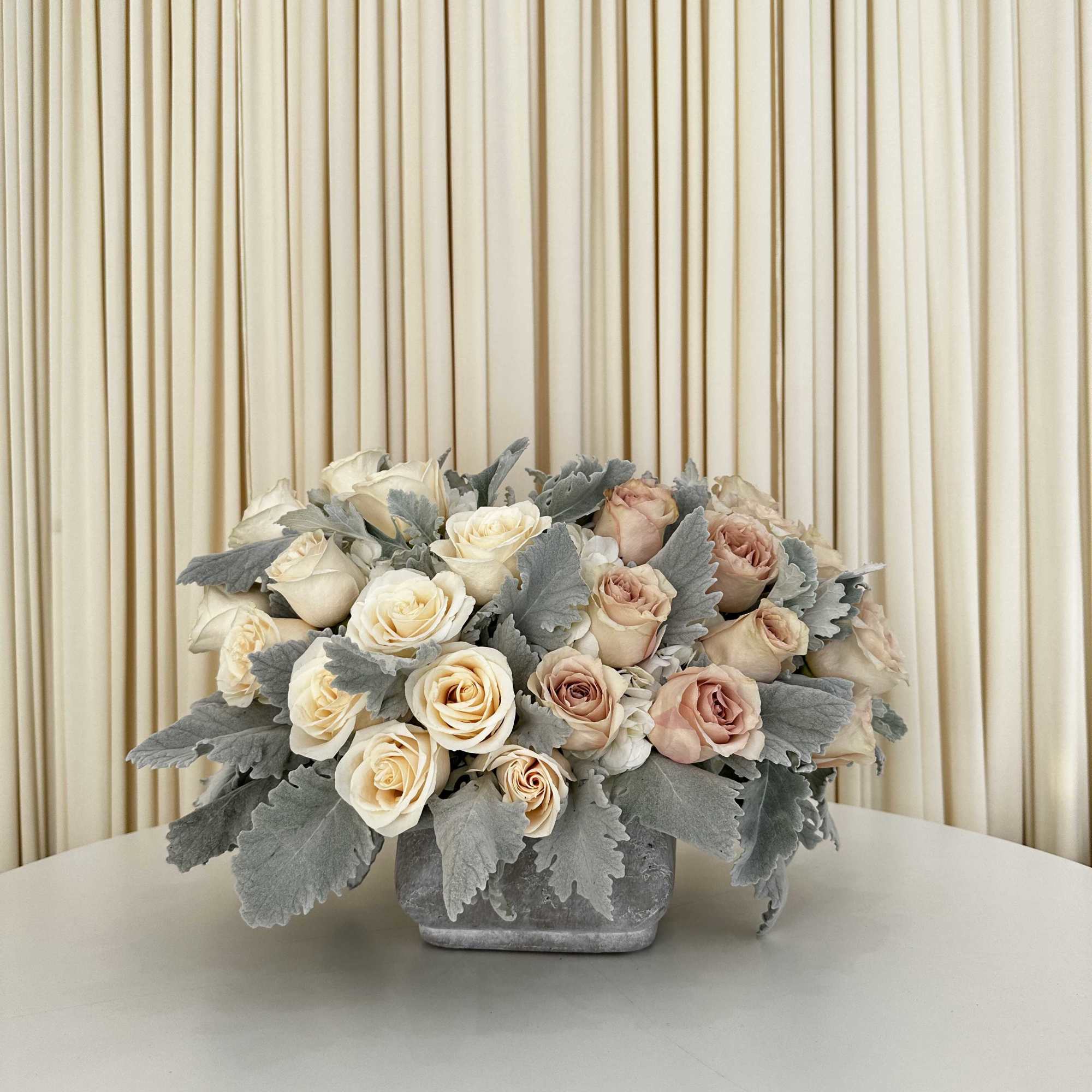 This exquisite flower arrangement, carefully curated to bring a burst of color