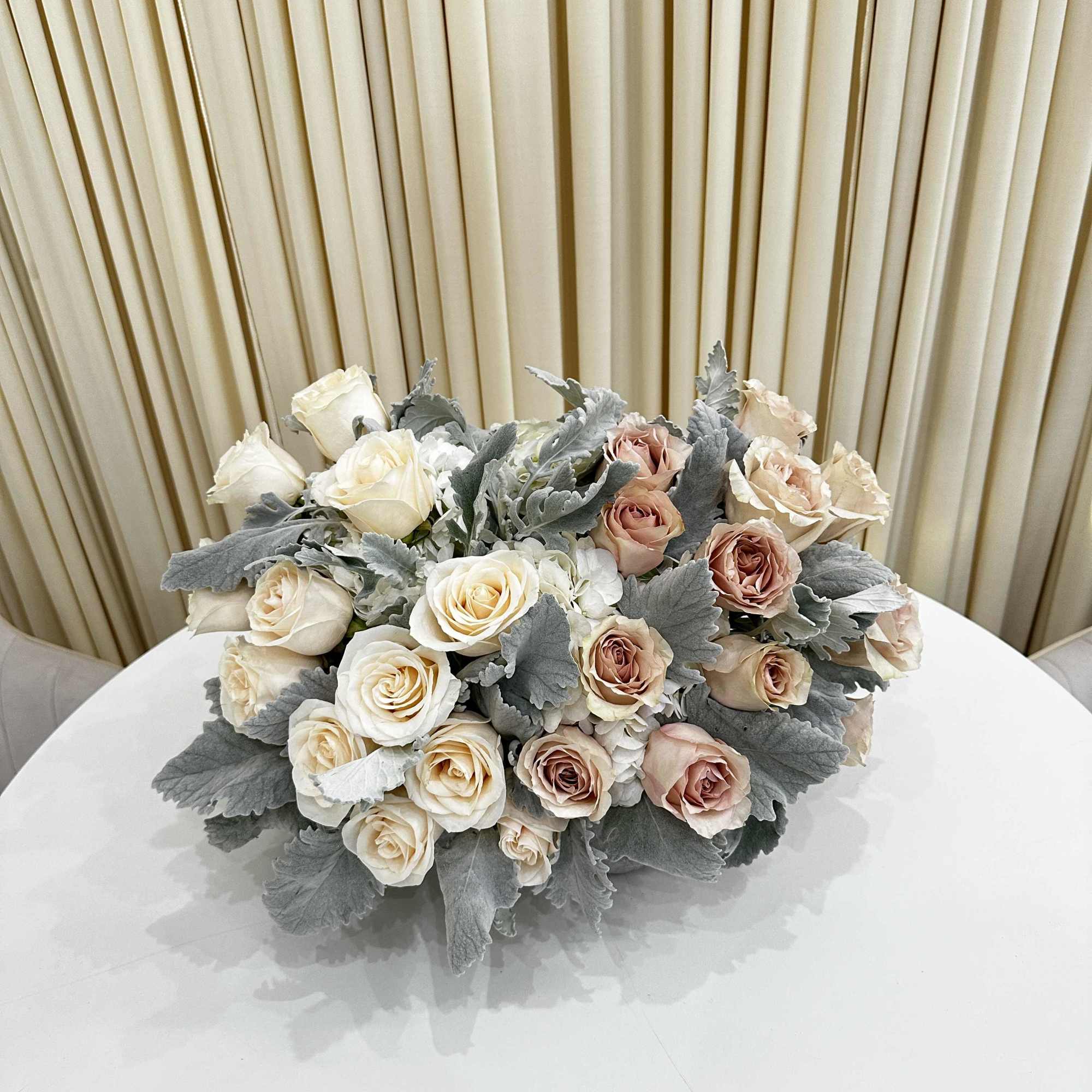 This exquisite flower arrangement, carefully curated to bring a burst of color