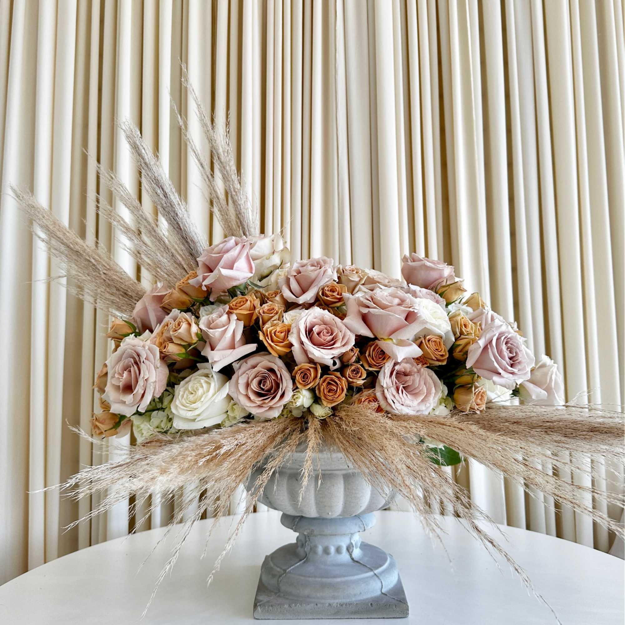 Introducing our exquisite &quot;Elegance in Bloom Pedestal Arrangement&quot; &ndash; a masterpiece of