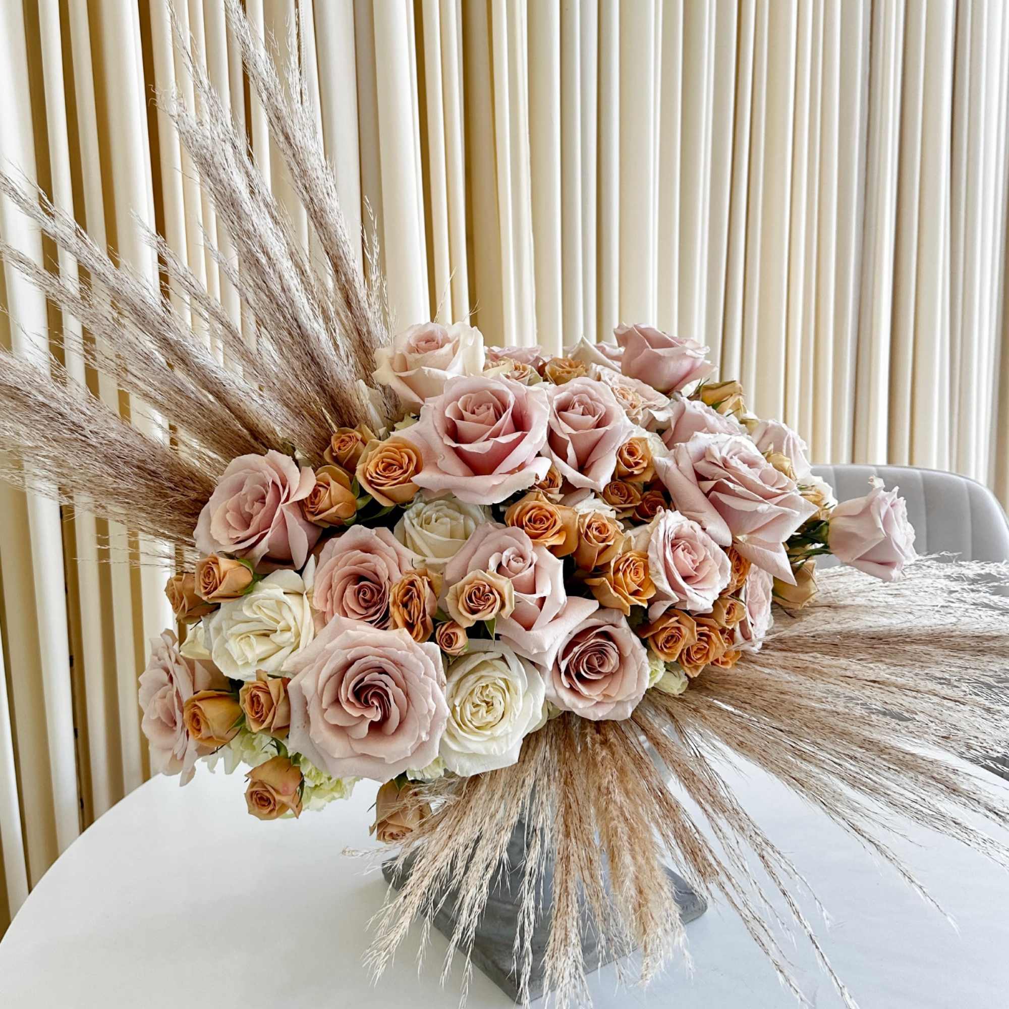 Introducing our exquisite &quot;Elegance in Bloom Pedestal Arrangement&quot; &ndash; a masterpiece of