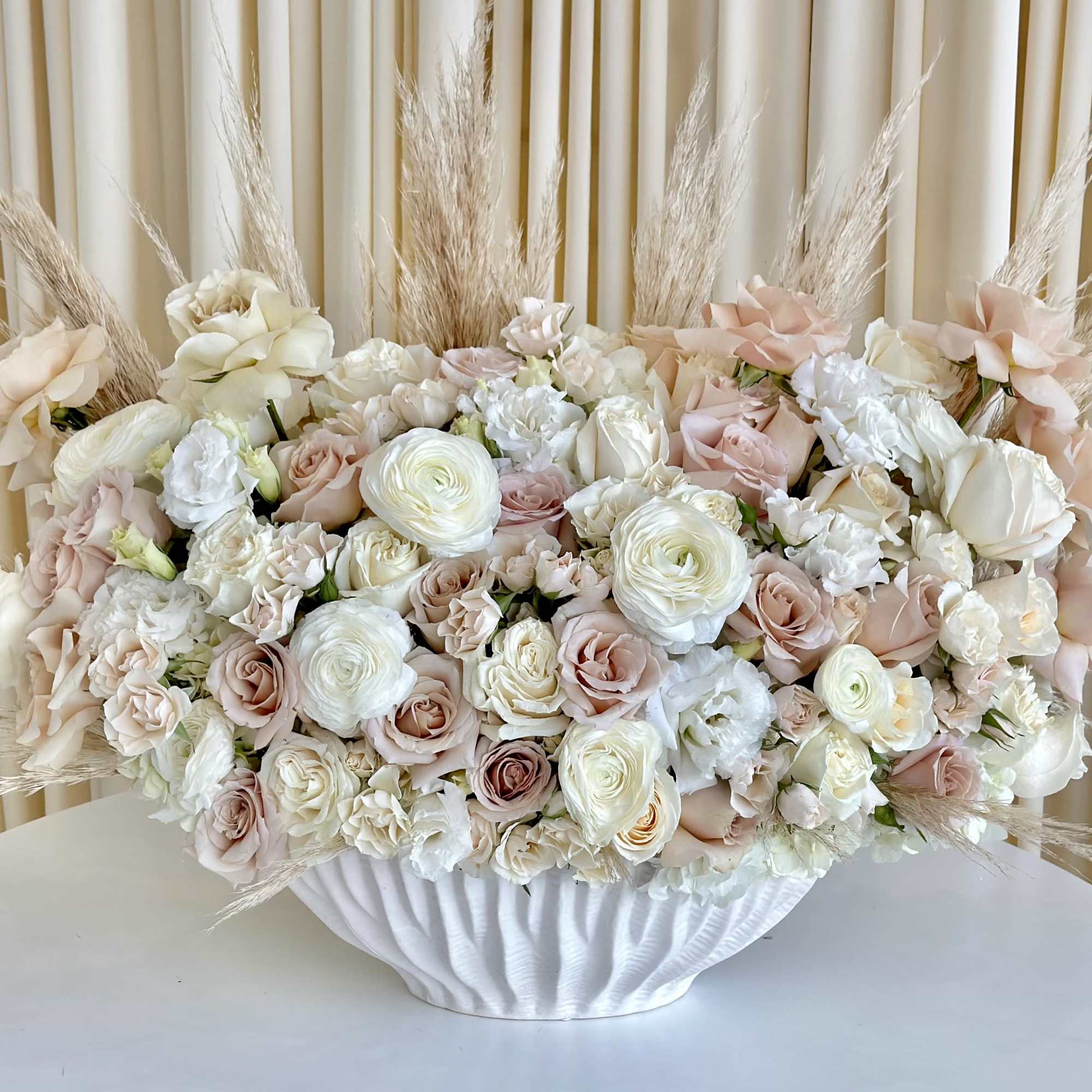 Welcome the serene beauty of &quot;Ethereal Harmony,&quot; a captivating flower arrangement featuring