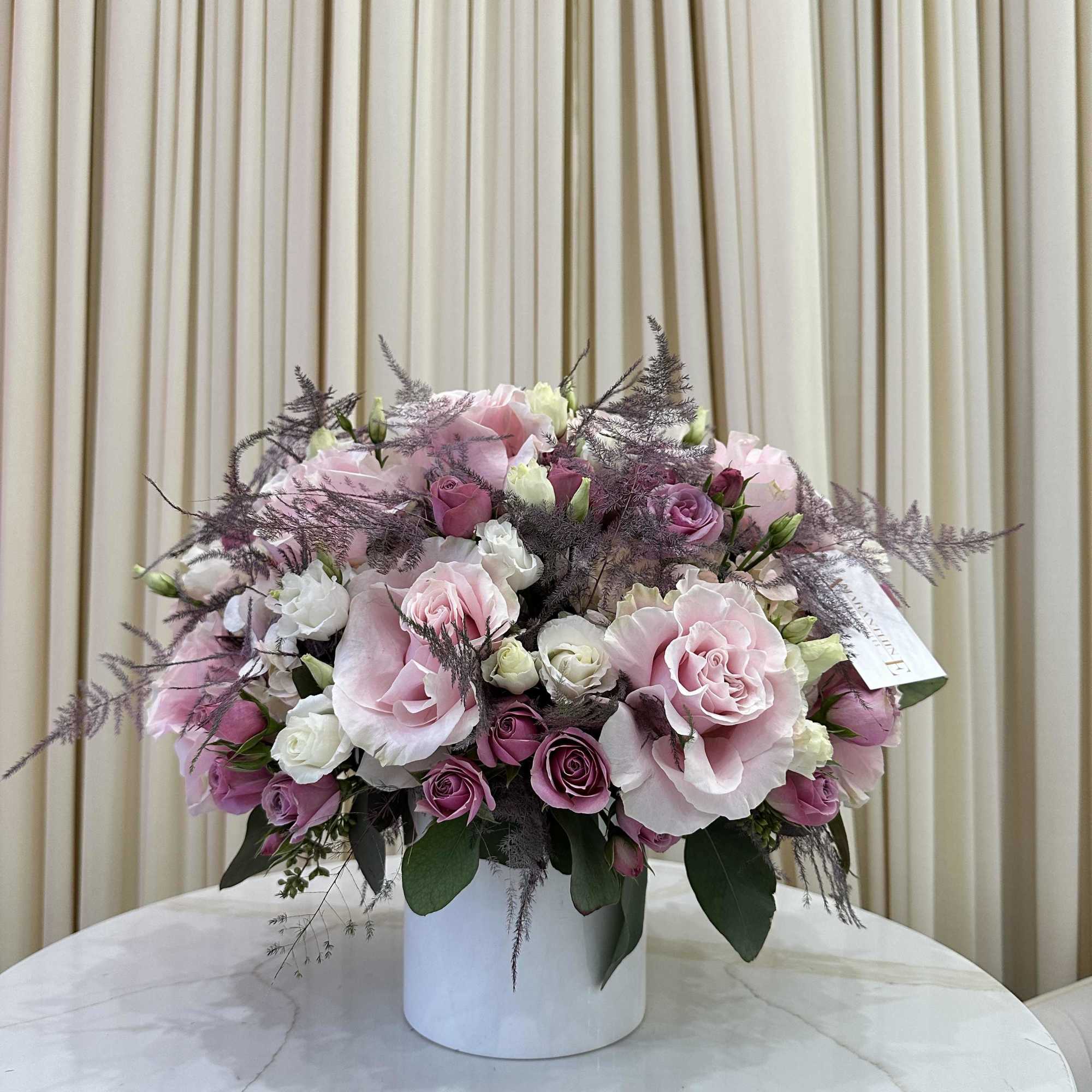 Bring a touch of springtime indoors with this cheerful arrangement of pastel-colored