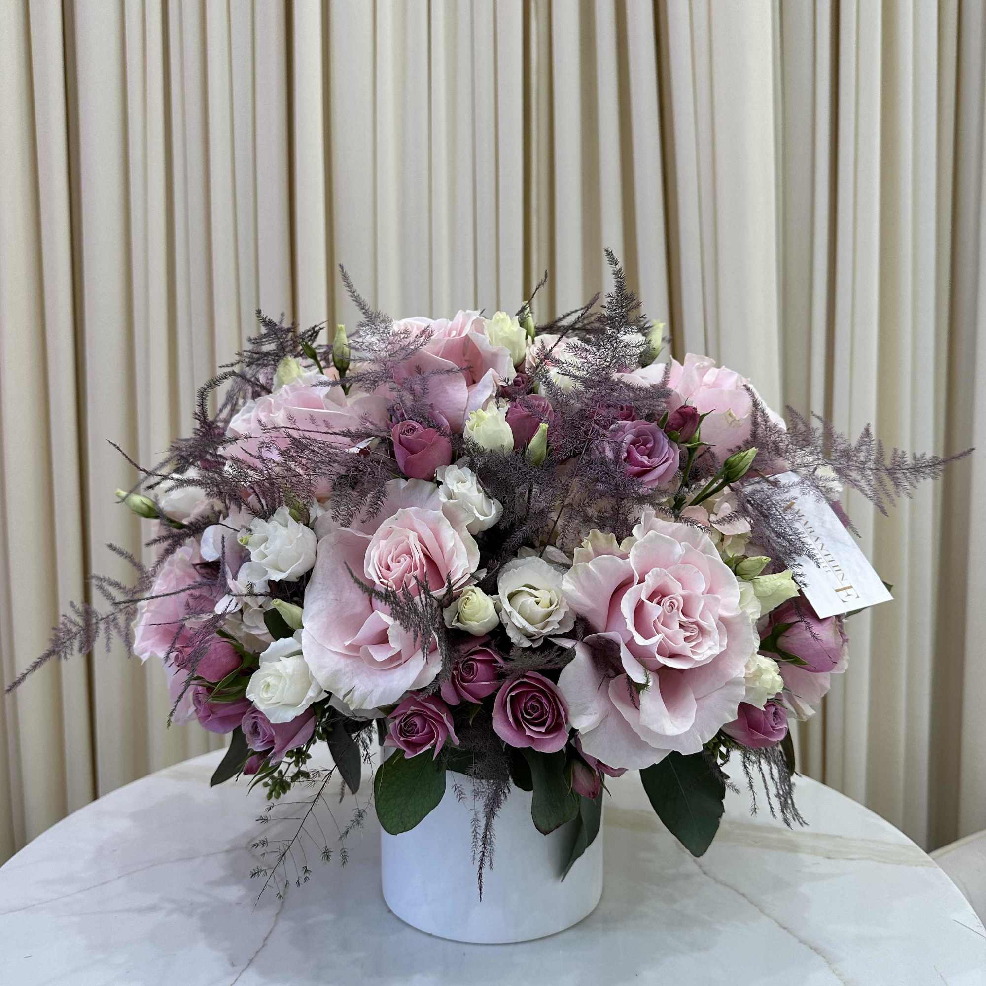 Bring a touch of springtime indoors with this cheerful arrangement of pastel-colored