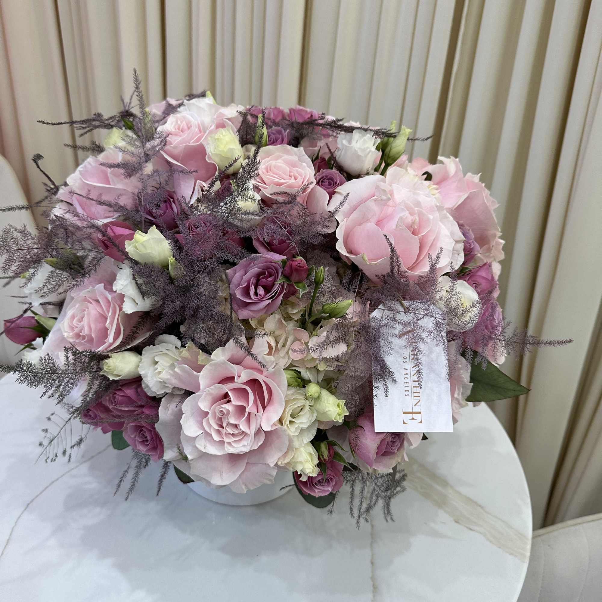 Bring a touch of springtime indoors with this cheerful arrangement of pastel-colored