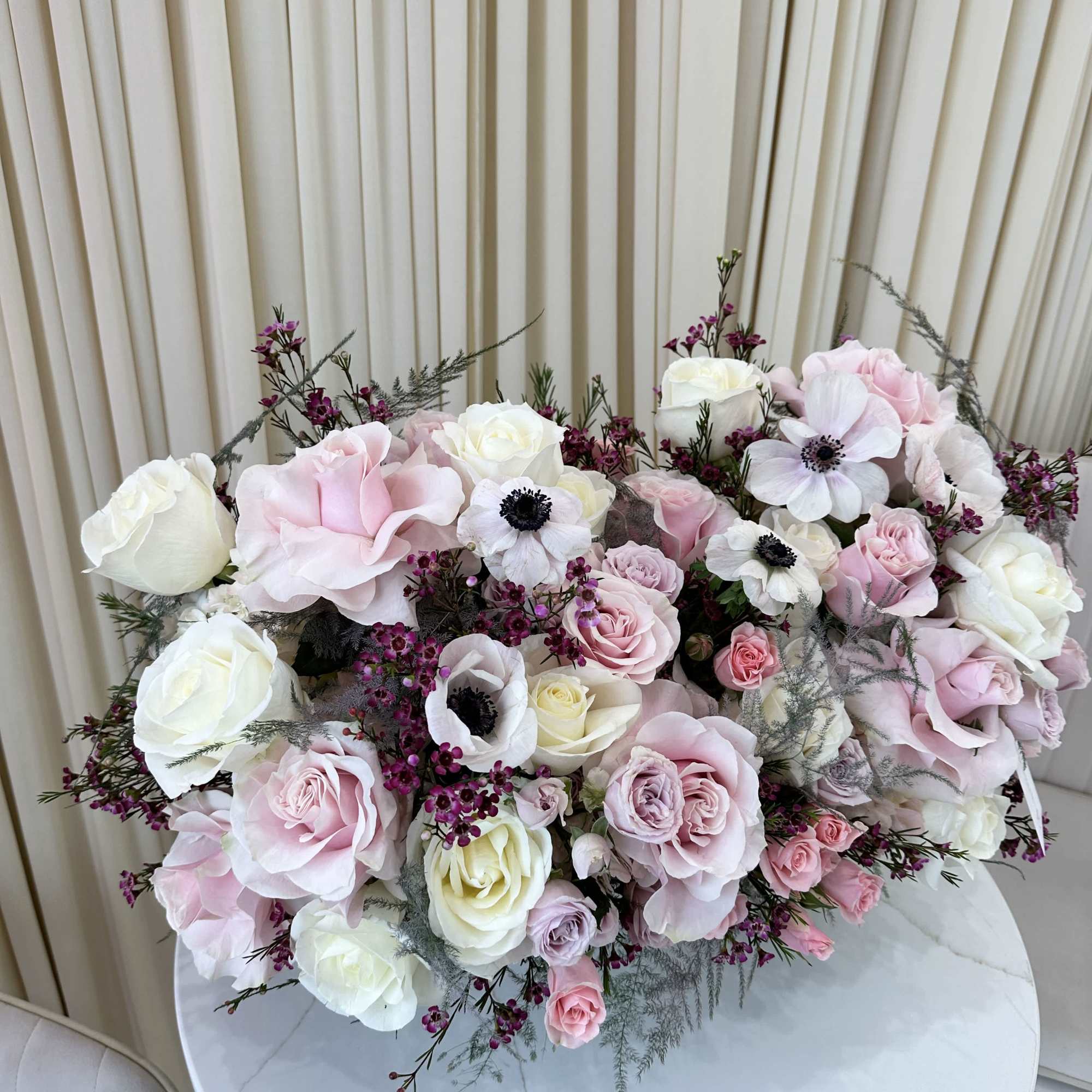 Celebrate the carefree spirit of summer with this playful arrangement. Bursting with