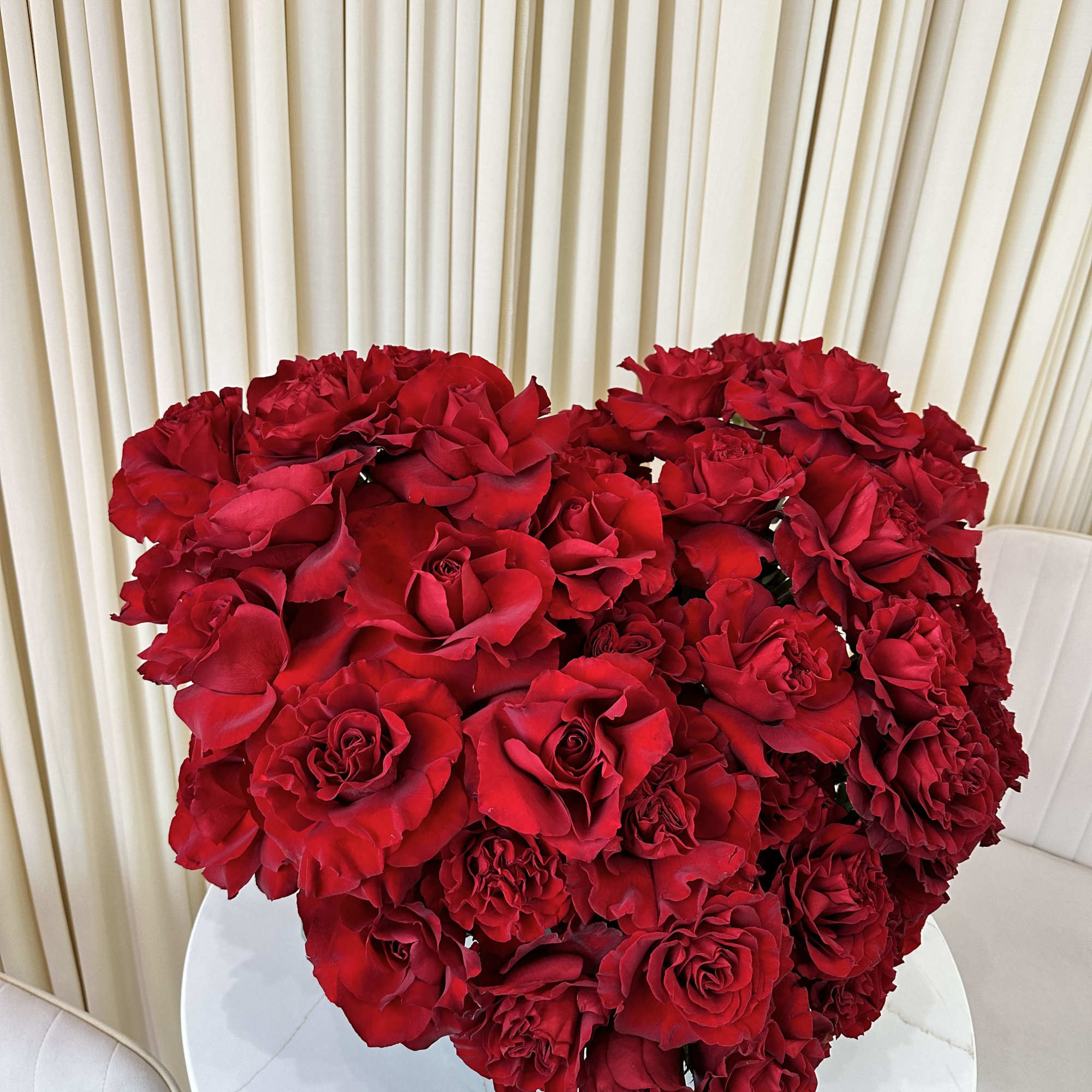 Shower your loved one with adoration with this captivating heart-shaped arrangement of