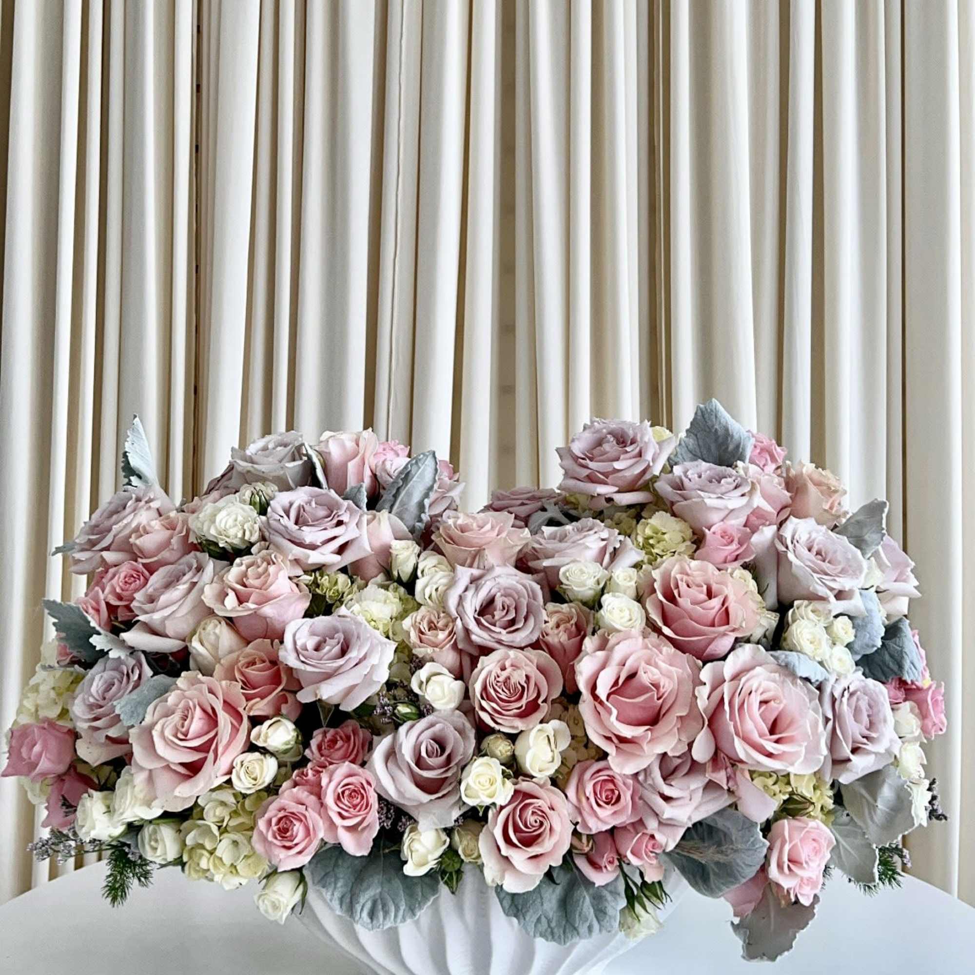 Introducing our exquisite &quot;Pastel Elegance Blossom&quot; &ndash; a stunning floral arrangement that