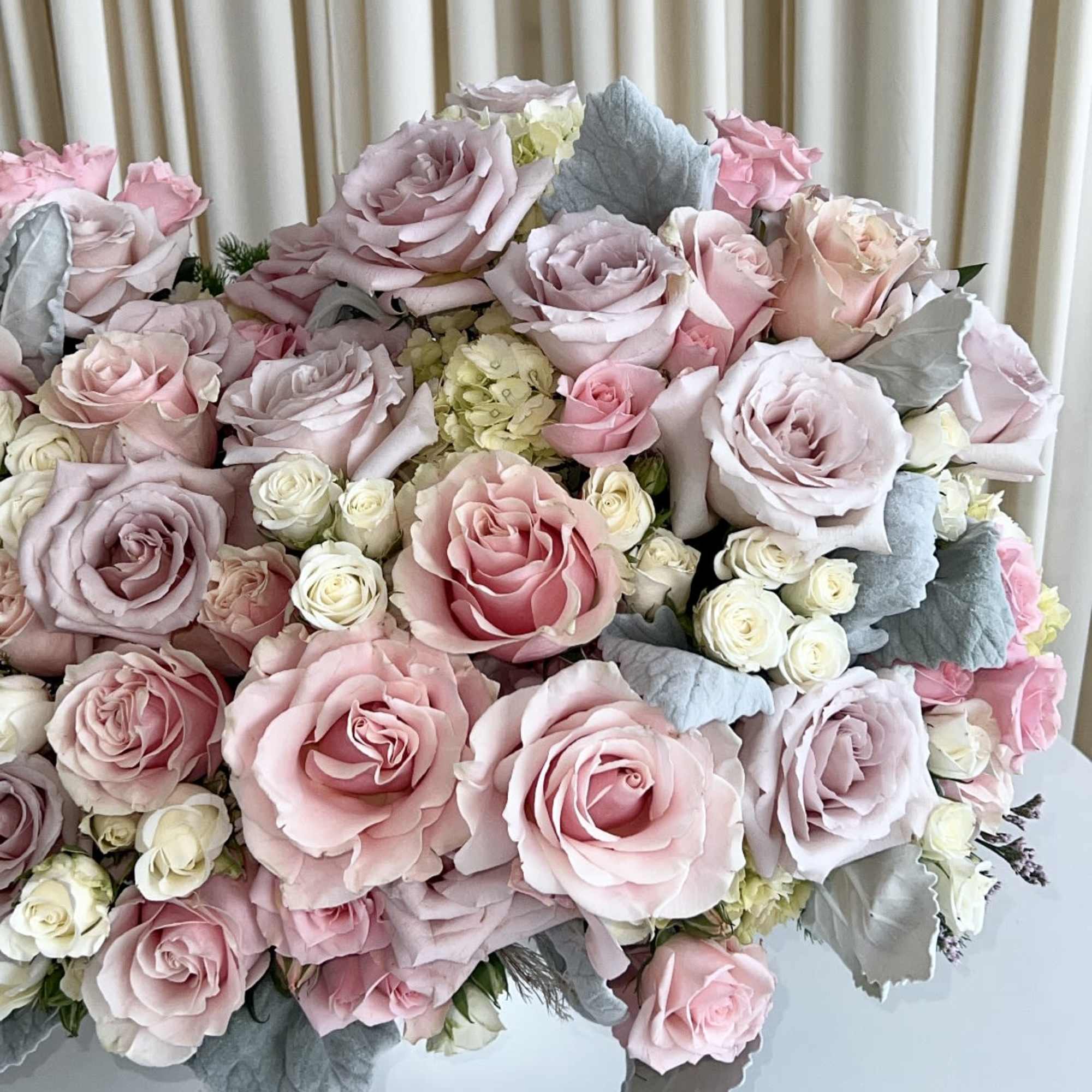 Introducing our exquisite &quot;Pastel Elegance Blossom&quot; &ndash; a stunning floral arrangement that