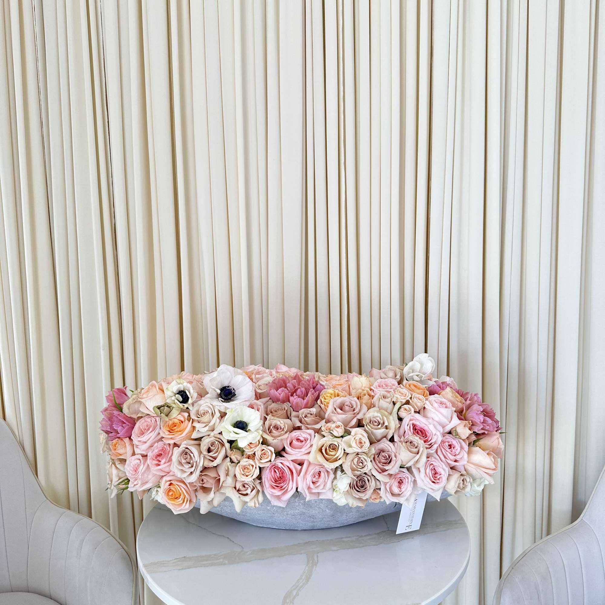 Woven together like a rich tapestry, this captivating bouquet features a beautiful