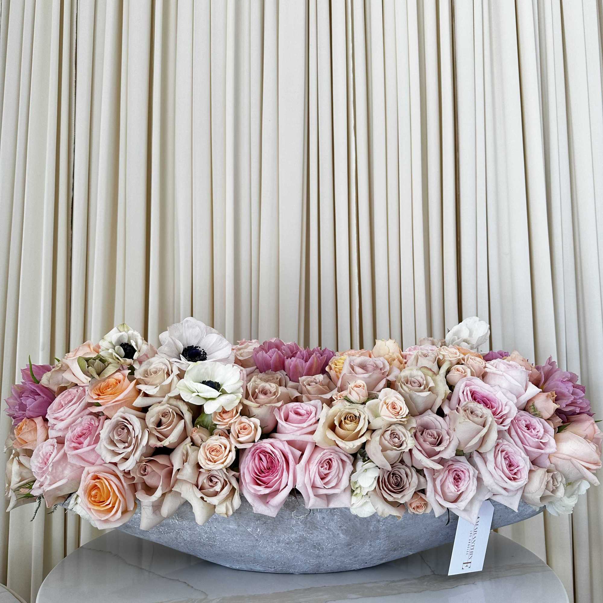 Woven together like a rich tapestry, this captivating bouquet features a beautiful