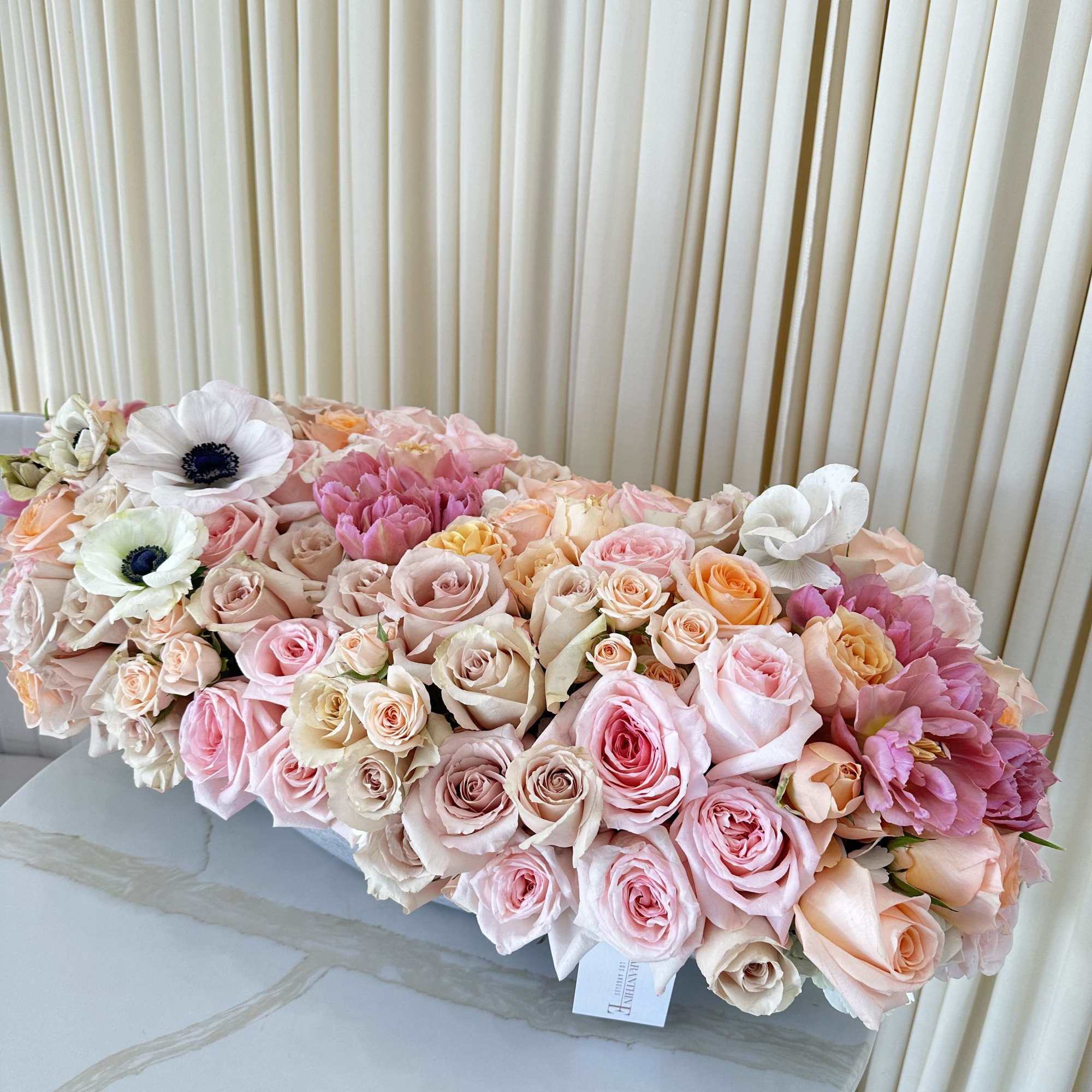 Woven together like a rich tapestry, this captivating bouquet features a beautiful