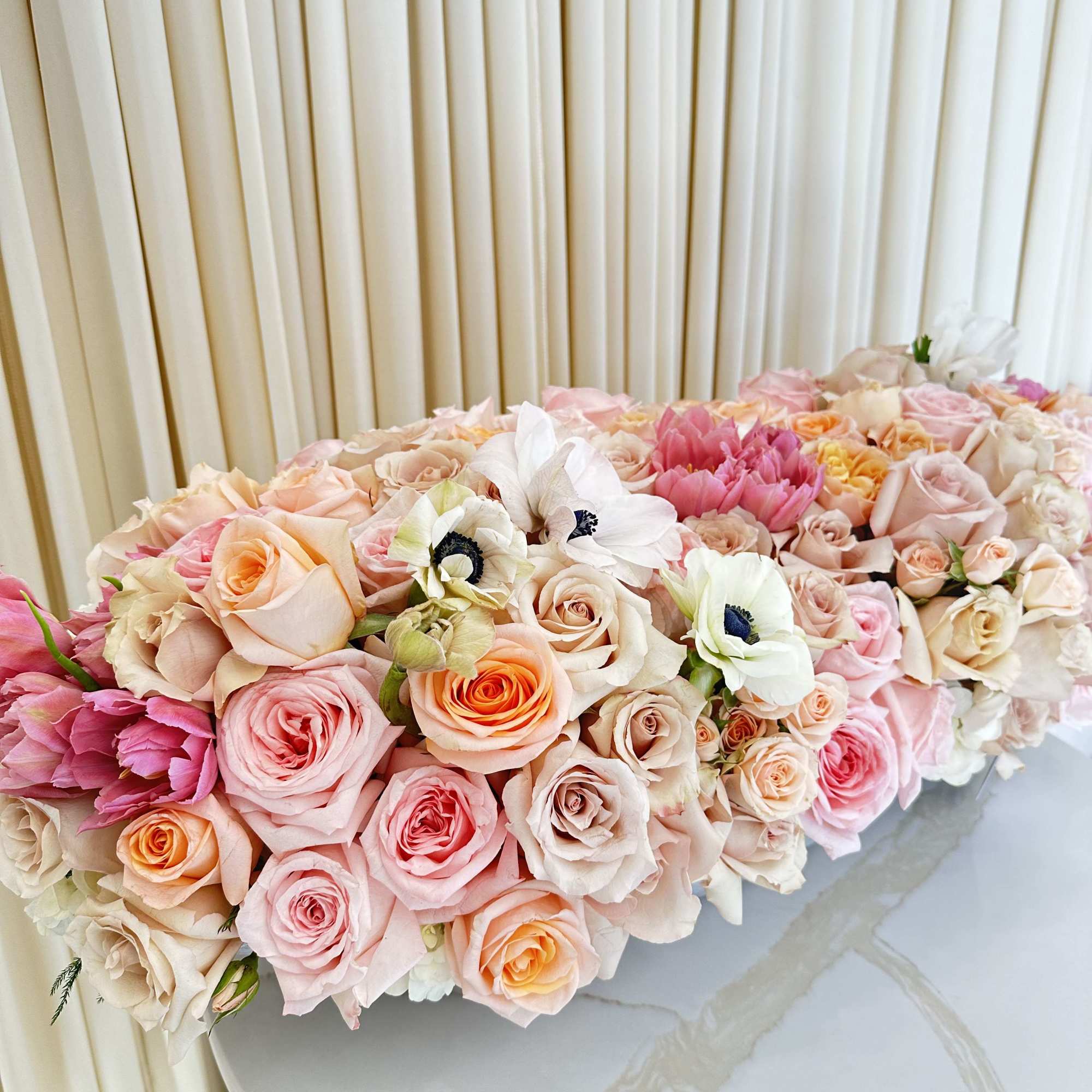 Woven together like a rich tapestry, this captivating bouquet features a beautiful
