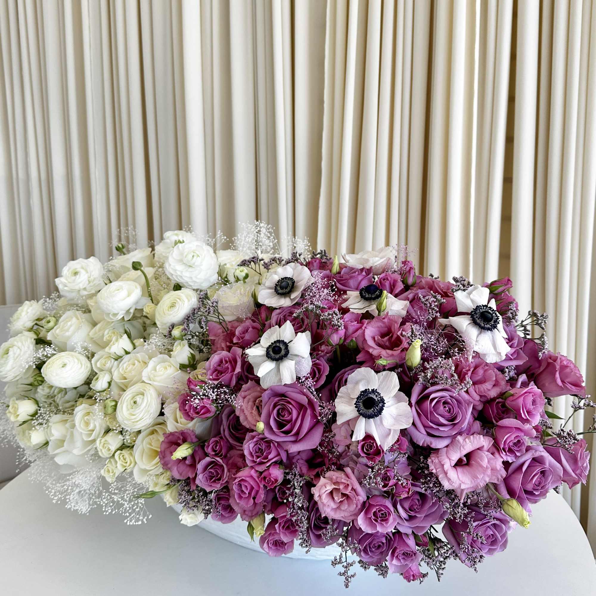 Experience the exquisite &quot;Harmony in Contrasts&quot; vase arrangement, where the timeless elegance
