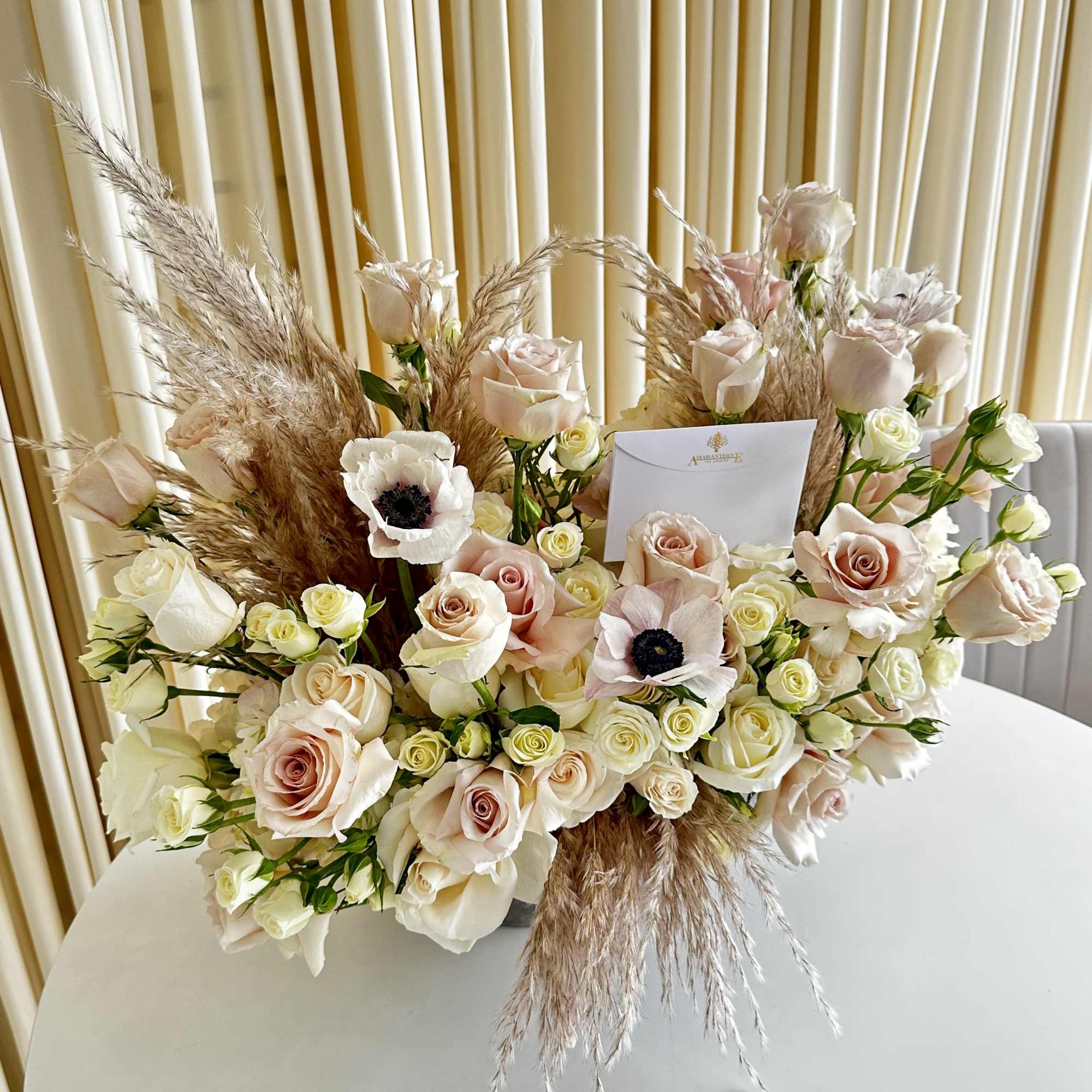 Immerse yourself in the allure of &quot;Rustic Reverie,&quot; our exquisite floral arrangement