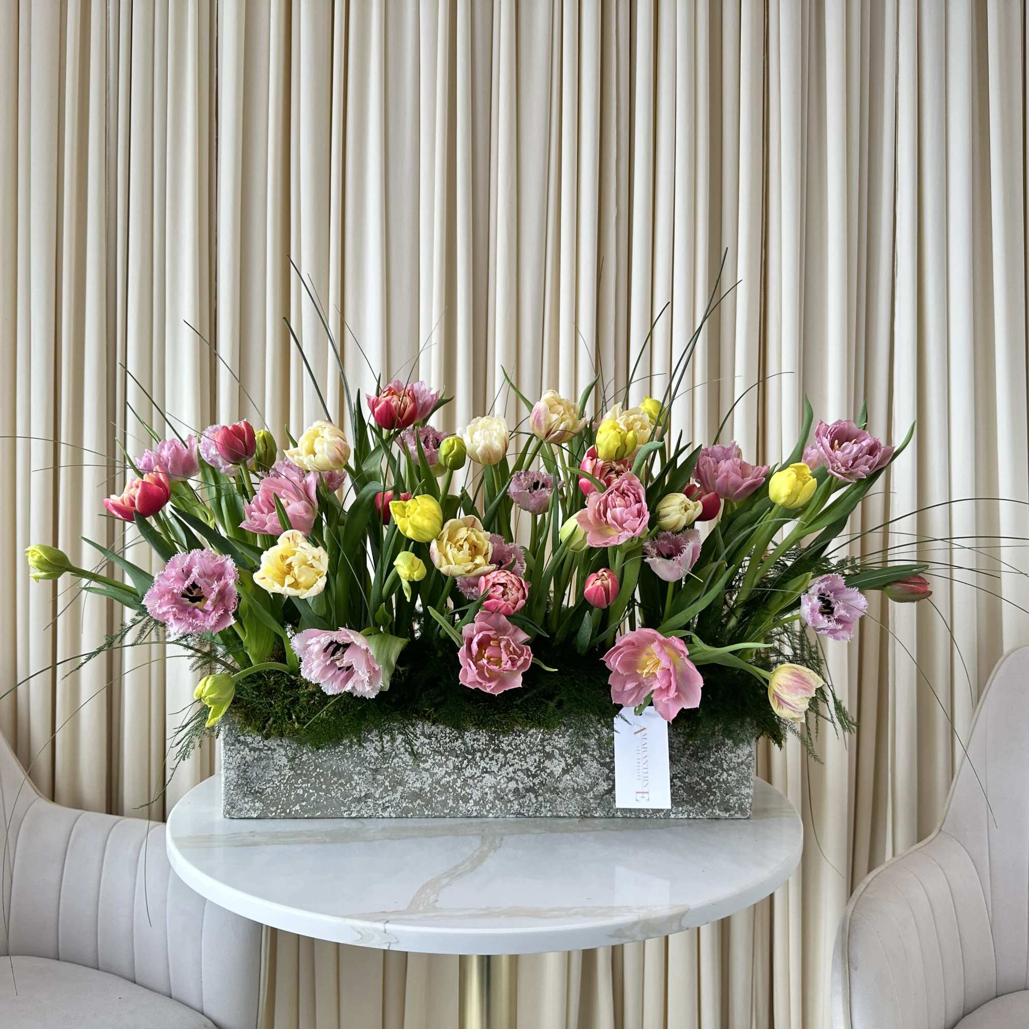 A delightful bouquet of garden tulips in a mix of classic and