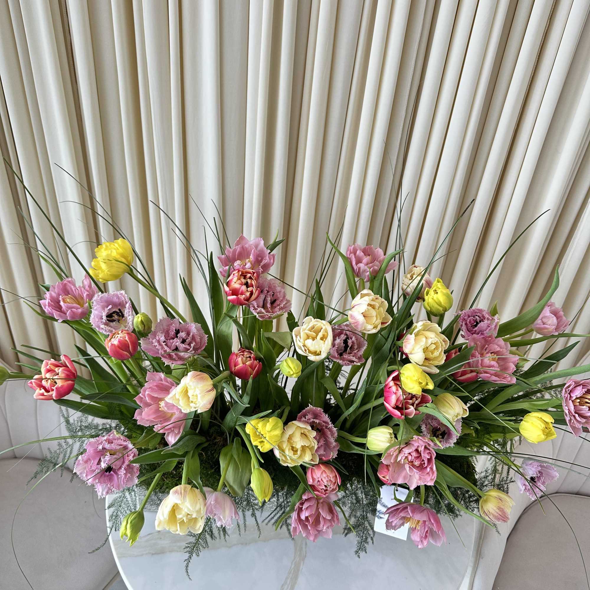 A delightful bouquet of garden tulips in a mix of classic and