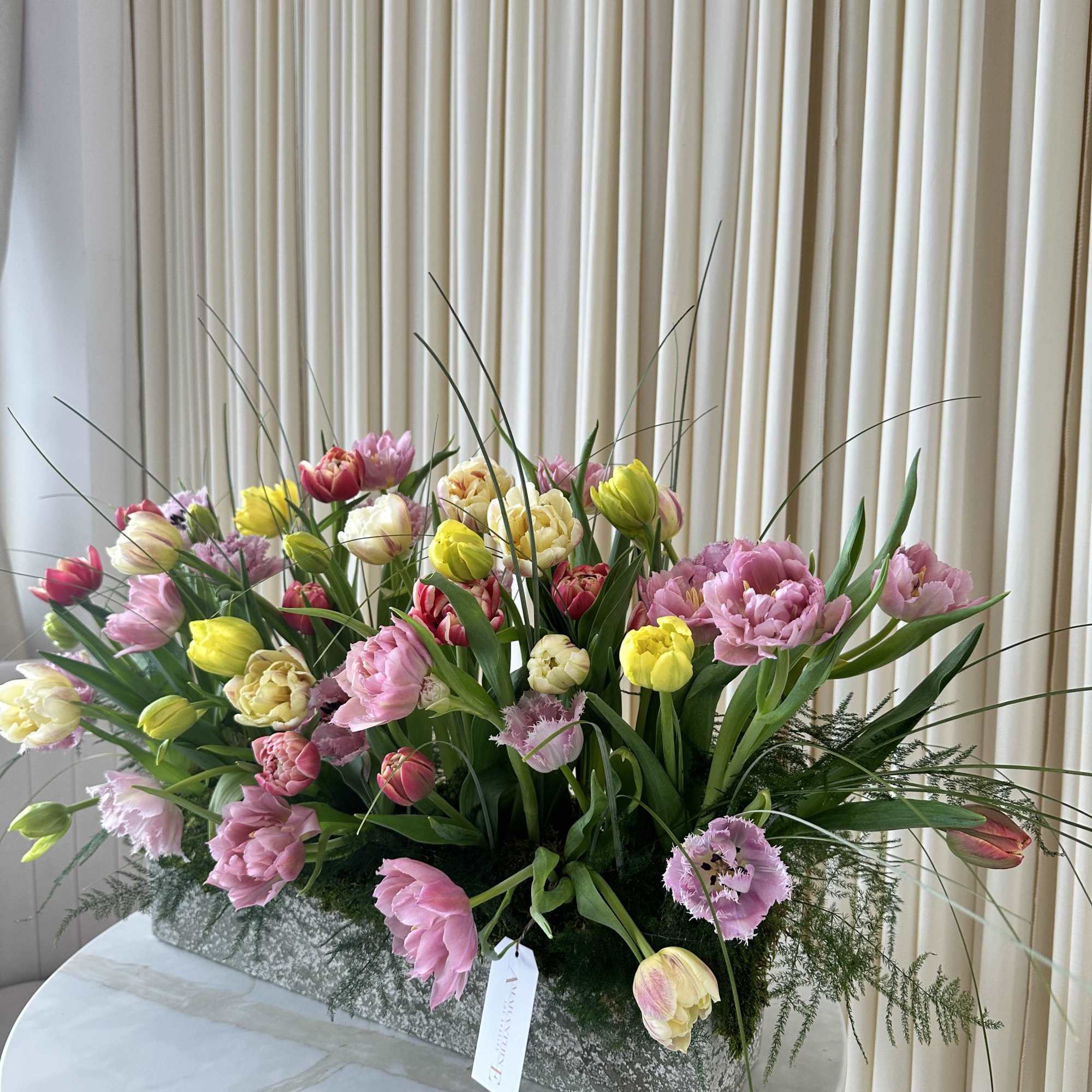 A delightful bouquet of garden tulips in a mix of classic and